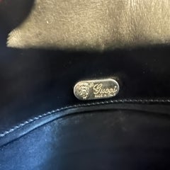 A 1970s Black Leather Shoulder Bag by Gucci