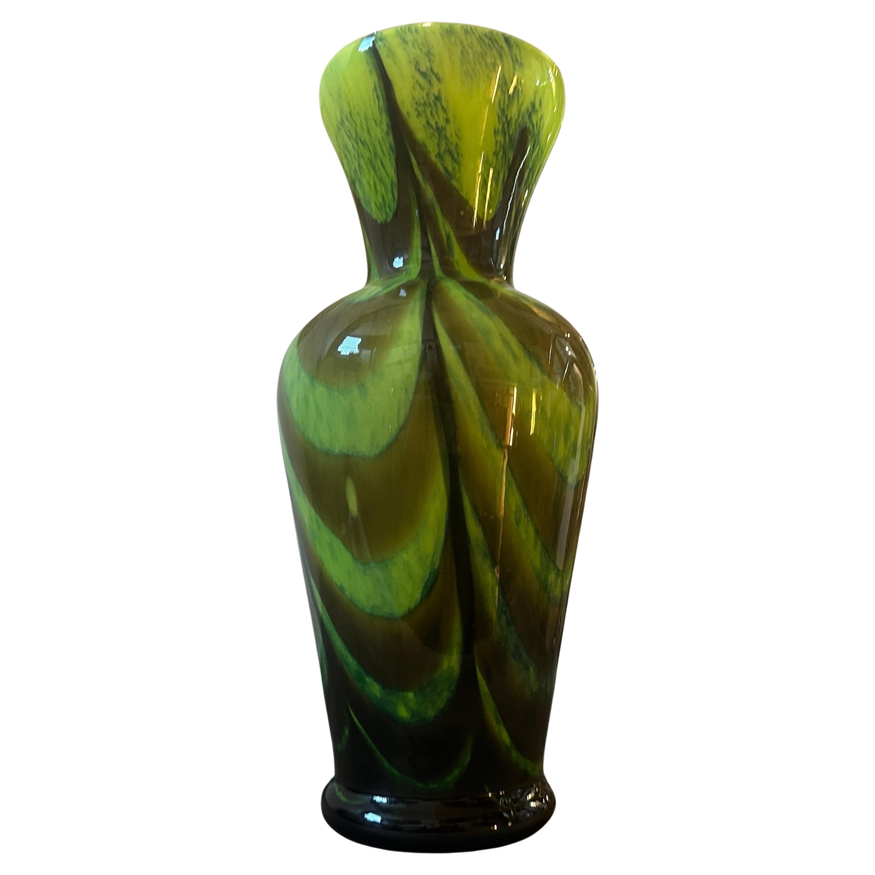 A perfect condition opaline glass vase designed and manufactured in Italy by Opaline Florence. The vase exudes a sense of artistic flair and sophistication, characteristic of Carlo Moretti's work. The combination of opaline glass and the Space Age