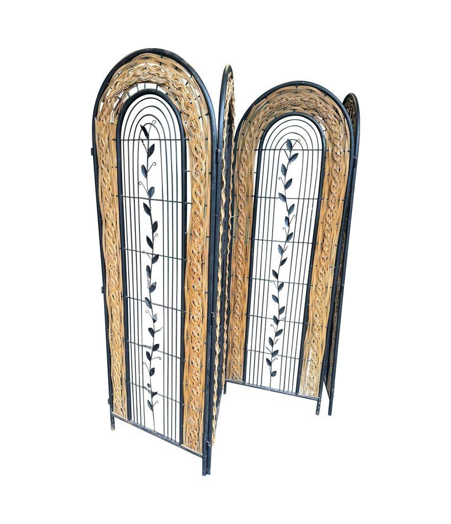 Late 20th Century A 1970s French woven rattan and metal four panelled room divider screen For Sale