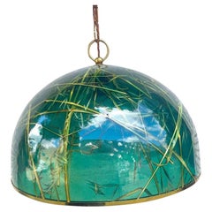 A 1970s green acrylic and brass light by Giovanni Banci for Banci Firenze