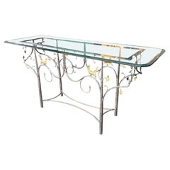 A 1970s handmade wrought iron console table with glass or solid marble top