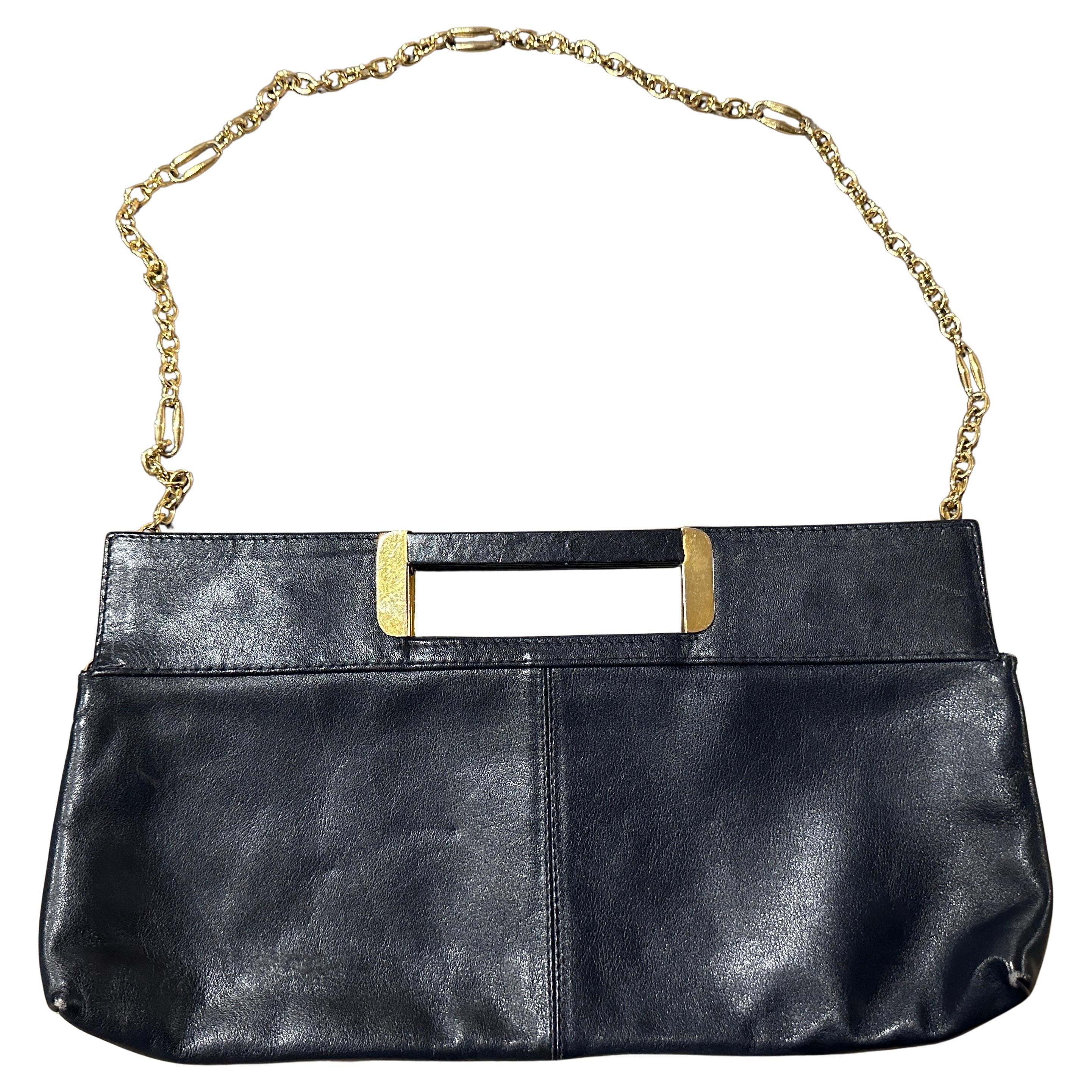This elegant 1970s Italian shoulder bag exemplifies the era’s understated luxury and superior craftsmanship. Crafted from a single piece of richly grained calfskin , the bag’s gently structured silhouette softly tapers toward the base. A subtle