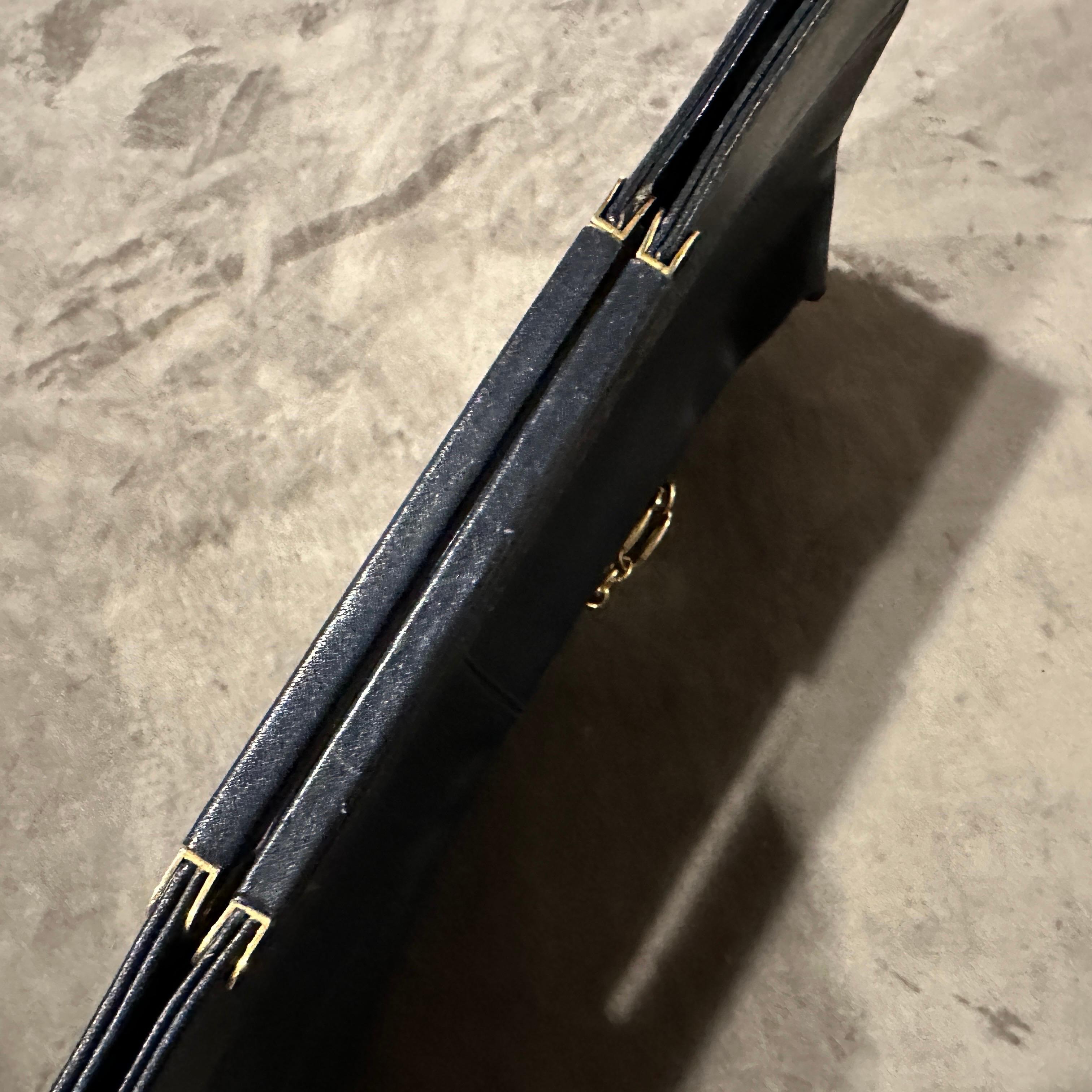 A 1970s High Quality Black Leather and Brass Italian Shoulder Bag For Sale 4