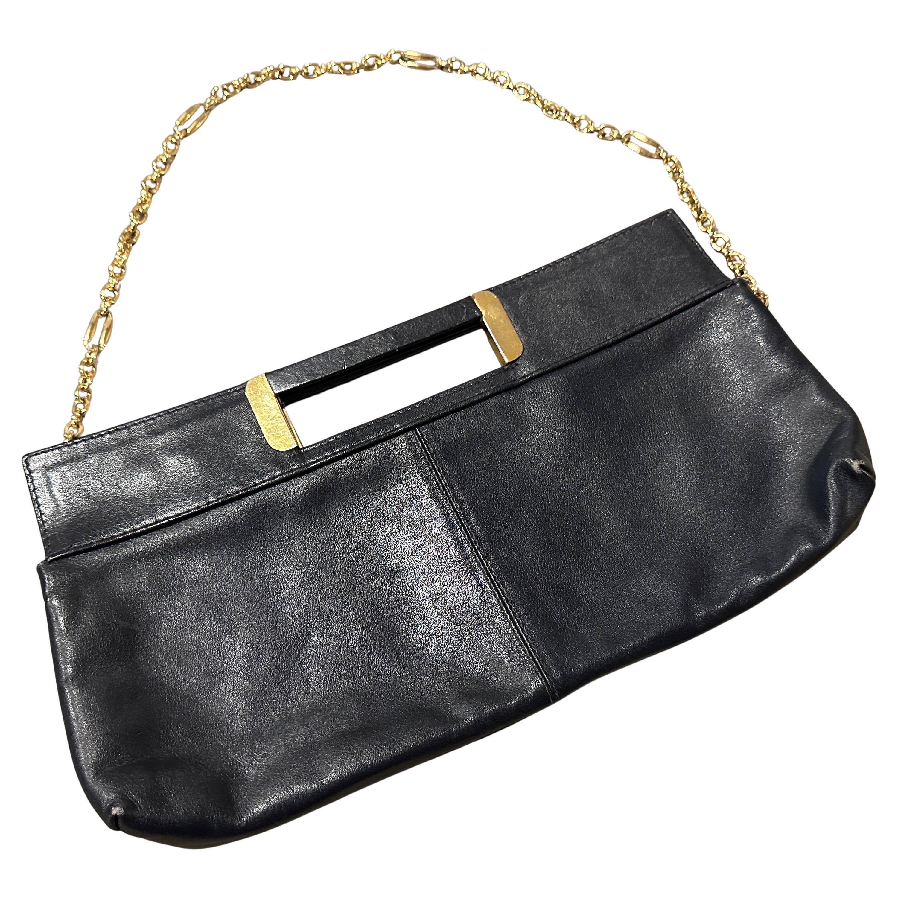 A 1970s High Quality Black Leather and Brass Italian Shoulder Bag For Sale