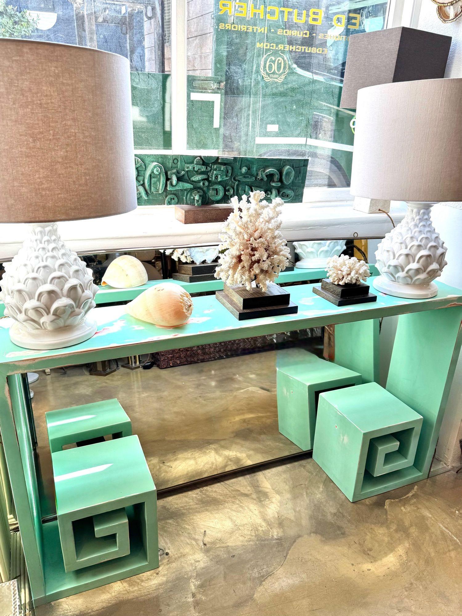 A 1970s console table with greek key design, in painted distressed beach finish. 