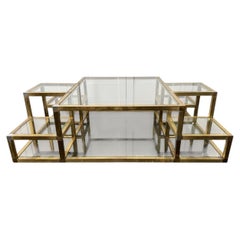 A 1970's Italian Multi-Tiered Brass & Glass Coffee Table