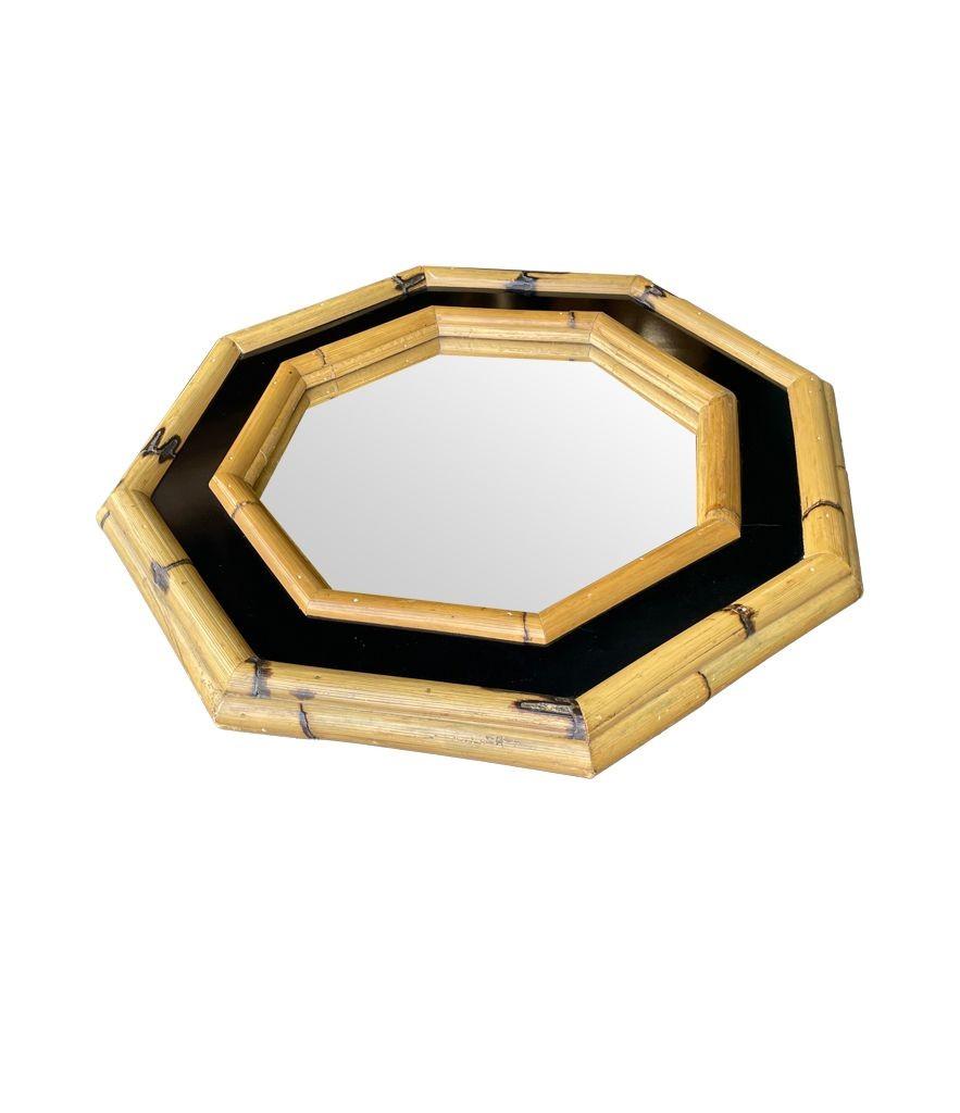 Late 20th Century A 1970s Italian octagonal bamboo mirror with black laminated centre For Sale