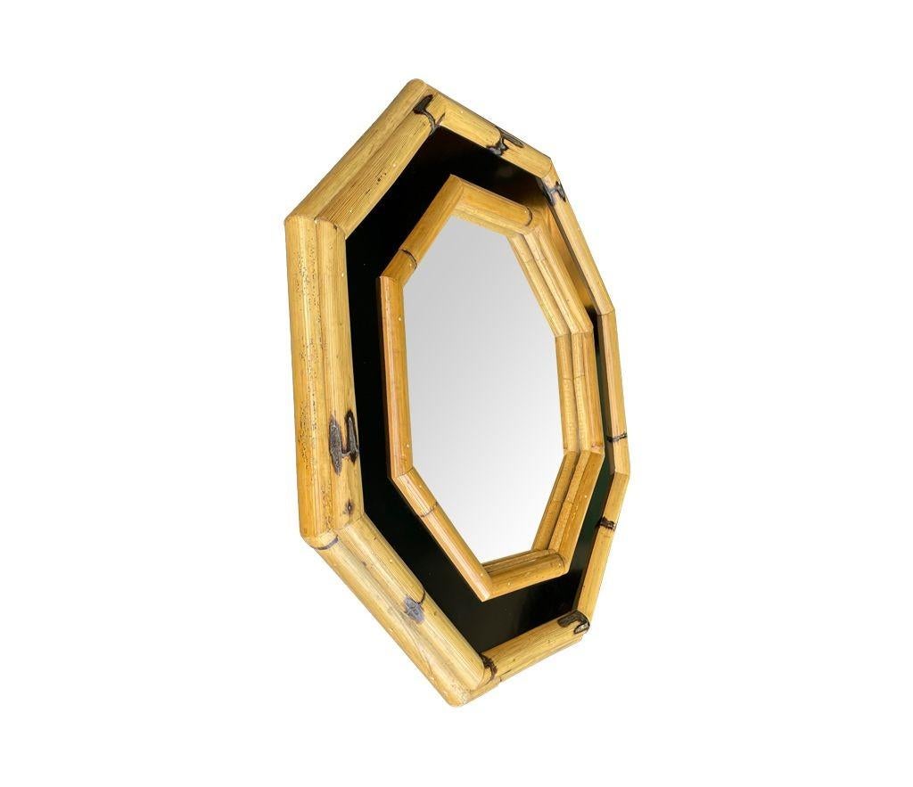 Bamboo A 1970s Italian octagonal bamboo mirror with black laminated centre For Sale