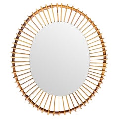 Miroir ovale italien des années 1970 en bambou et roseau crayon avec plaque de miroir ovale