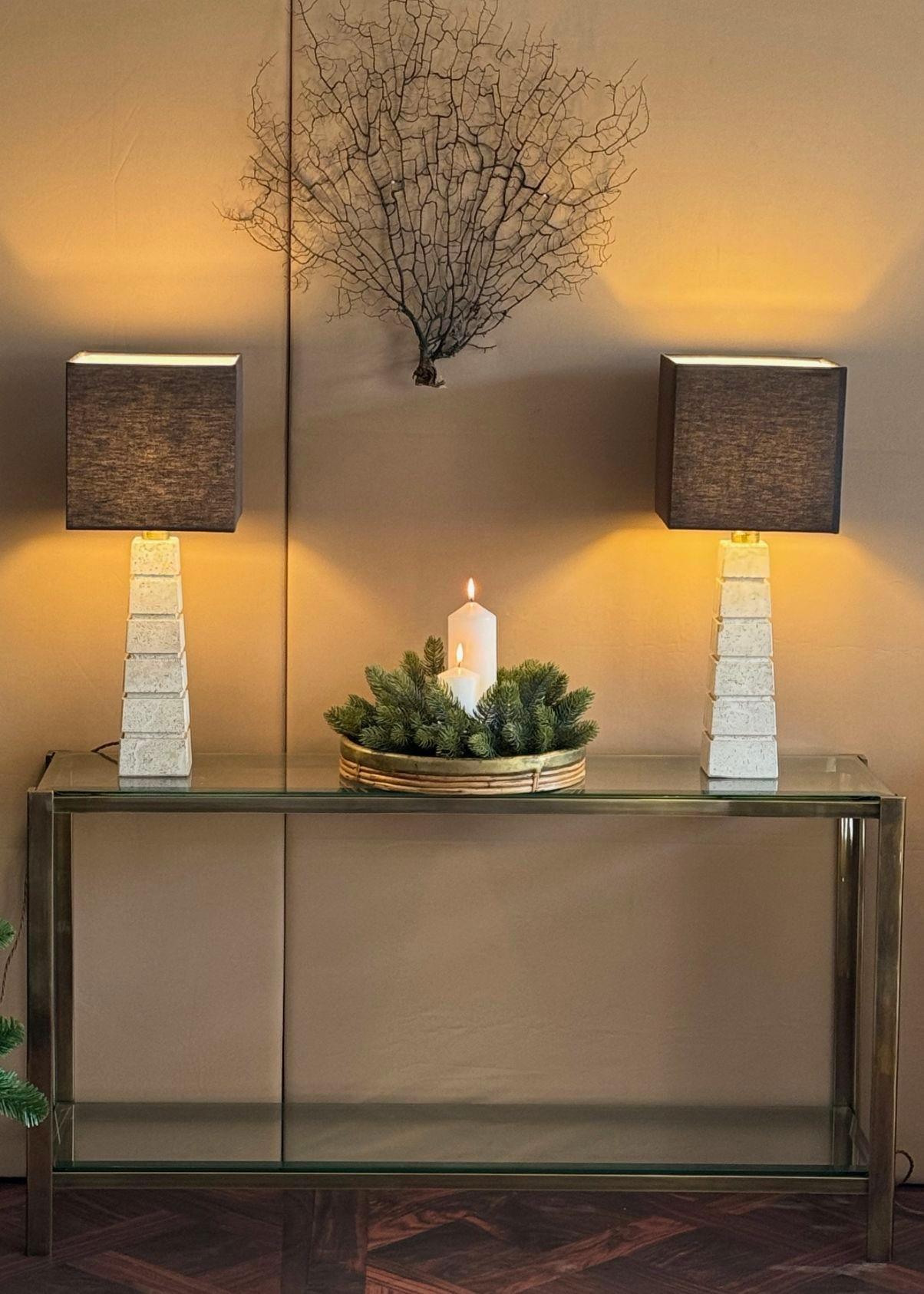 A 1970s Italian good quality solid brass console table with 2 thick beveled glass shelves