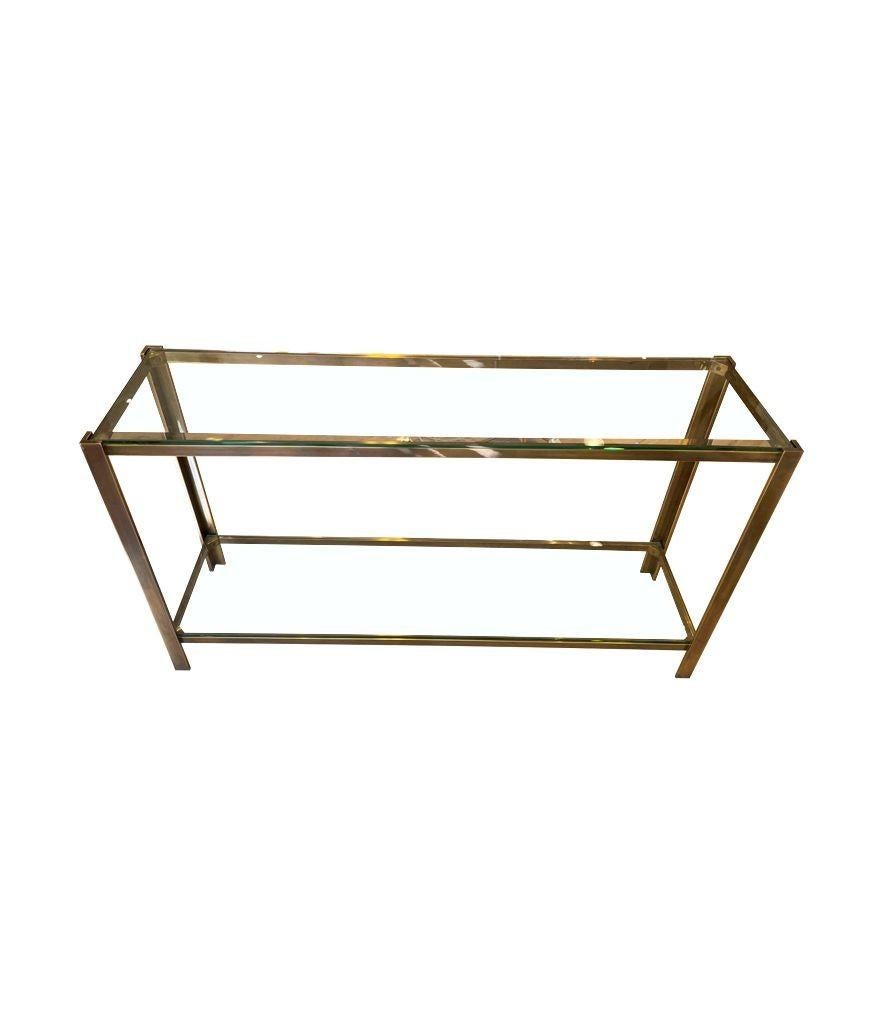 A 1970s Italian solid brass console table with 2 glass shelves In Good Condition In London, GB