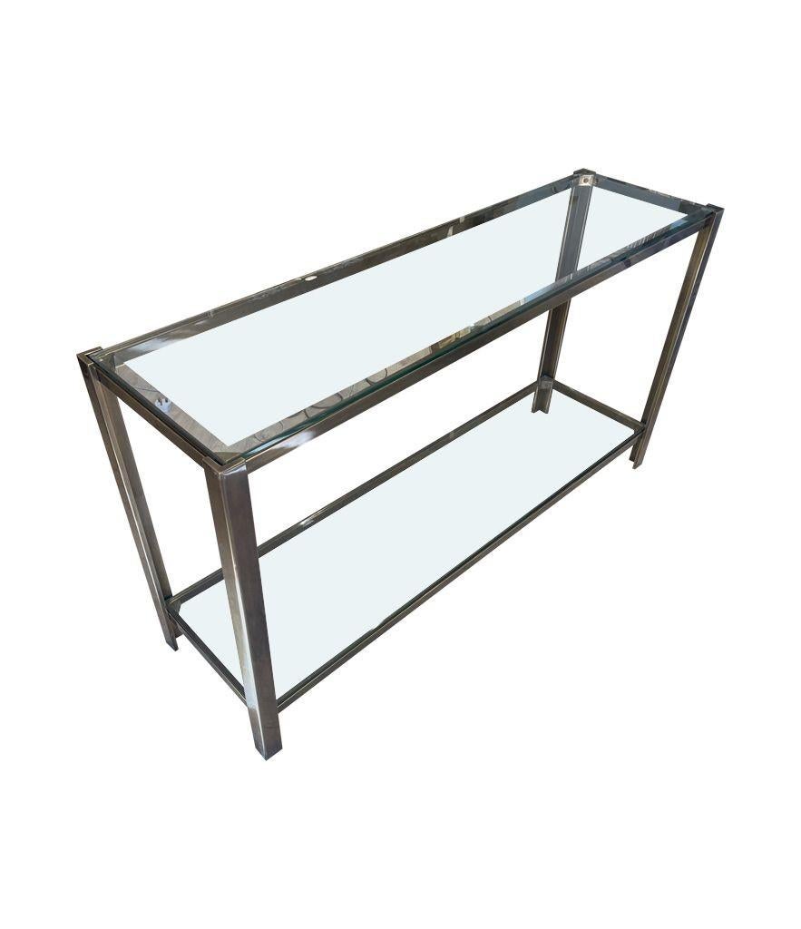 Brass A 1970s Italian solid brass console table with 2 glass shelves