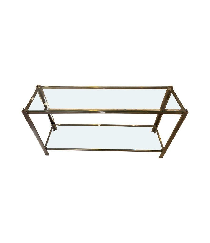 A 1970s Italian solid brass console table with 2 glass shelves 3