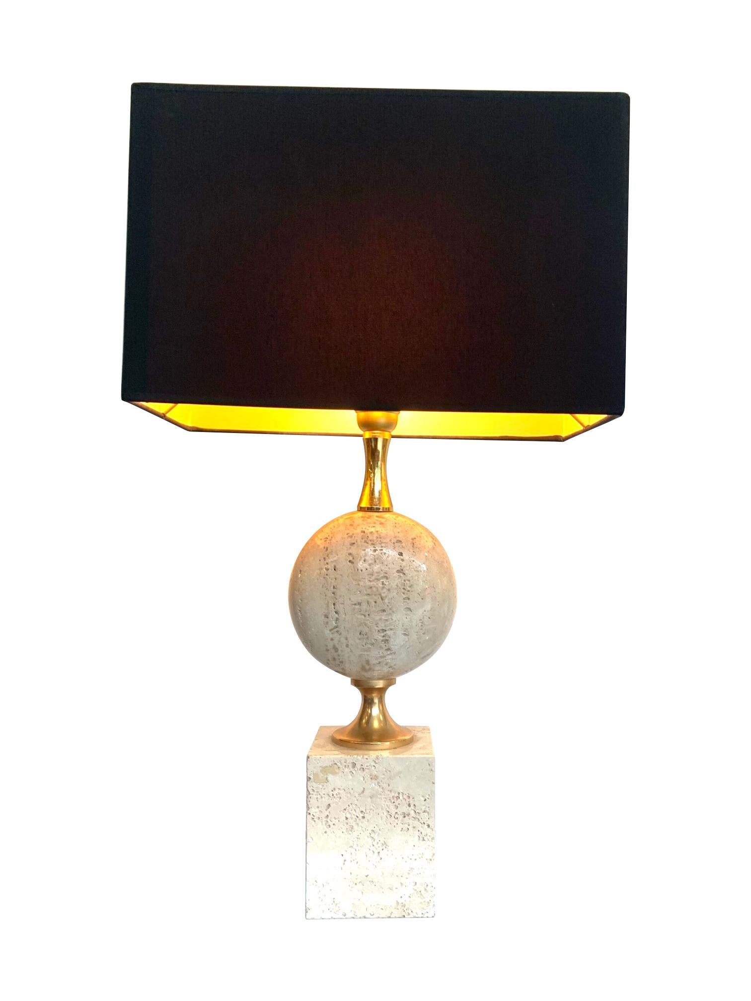 A 1970s Maison Barbier travertine and brass lamp with new bespoke black and gold lined shade. Re wired with antique gold cord flex and PAT tested.