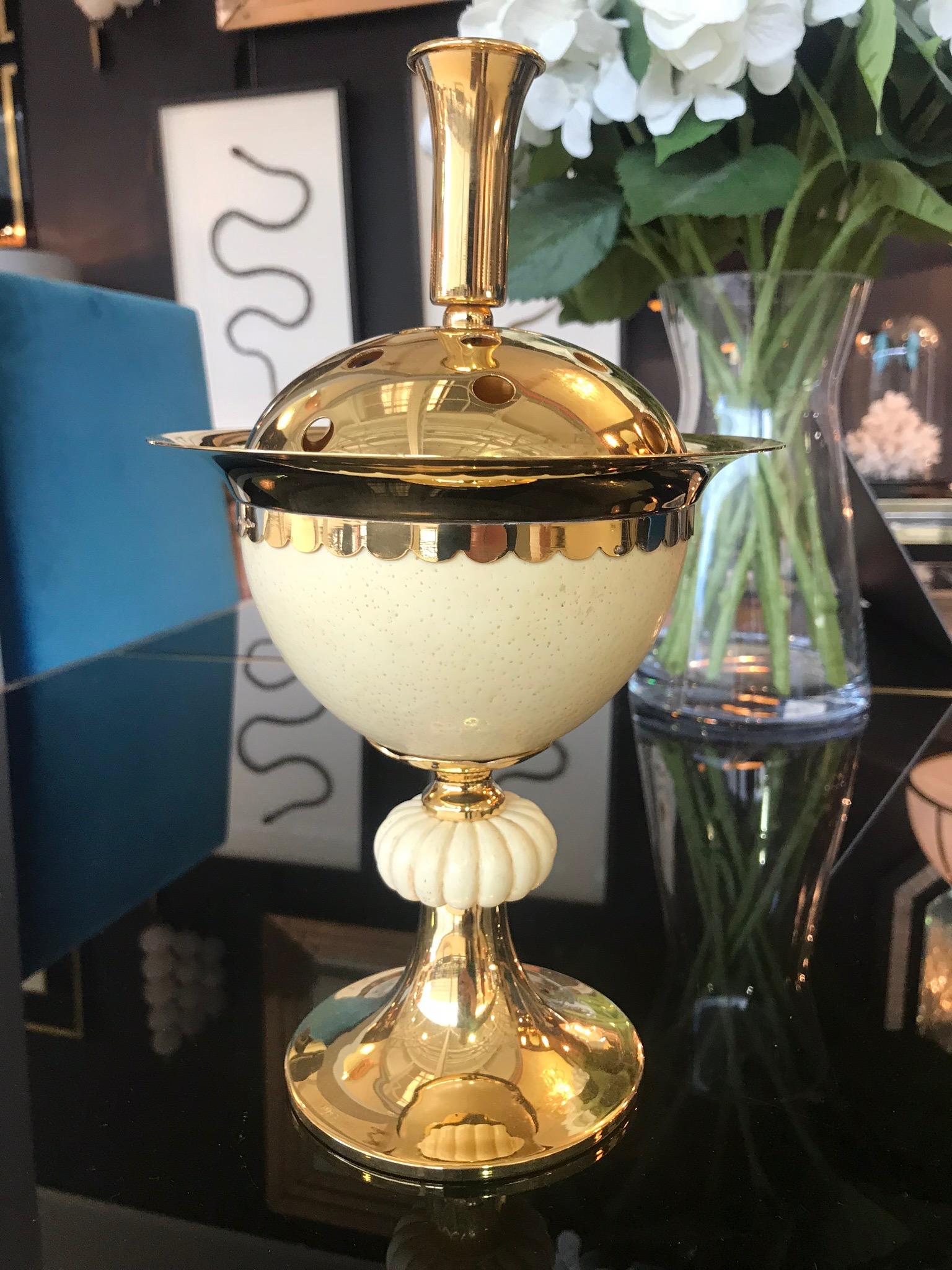 A 1970s potpourri holder in gilt metal mounted with real ostrich egg centre by Christian Dior Home. Stamped on the side 