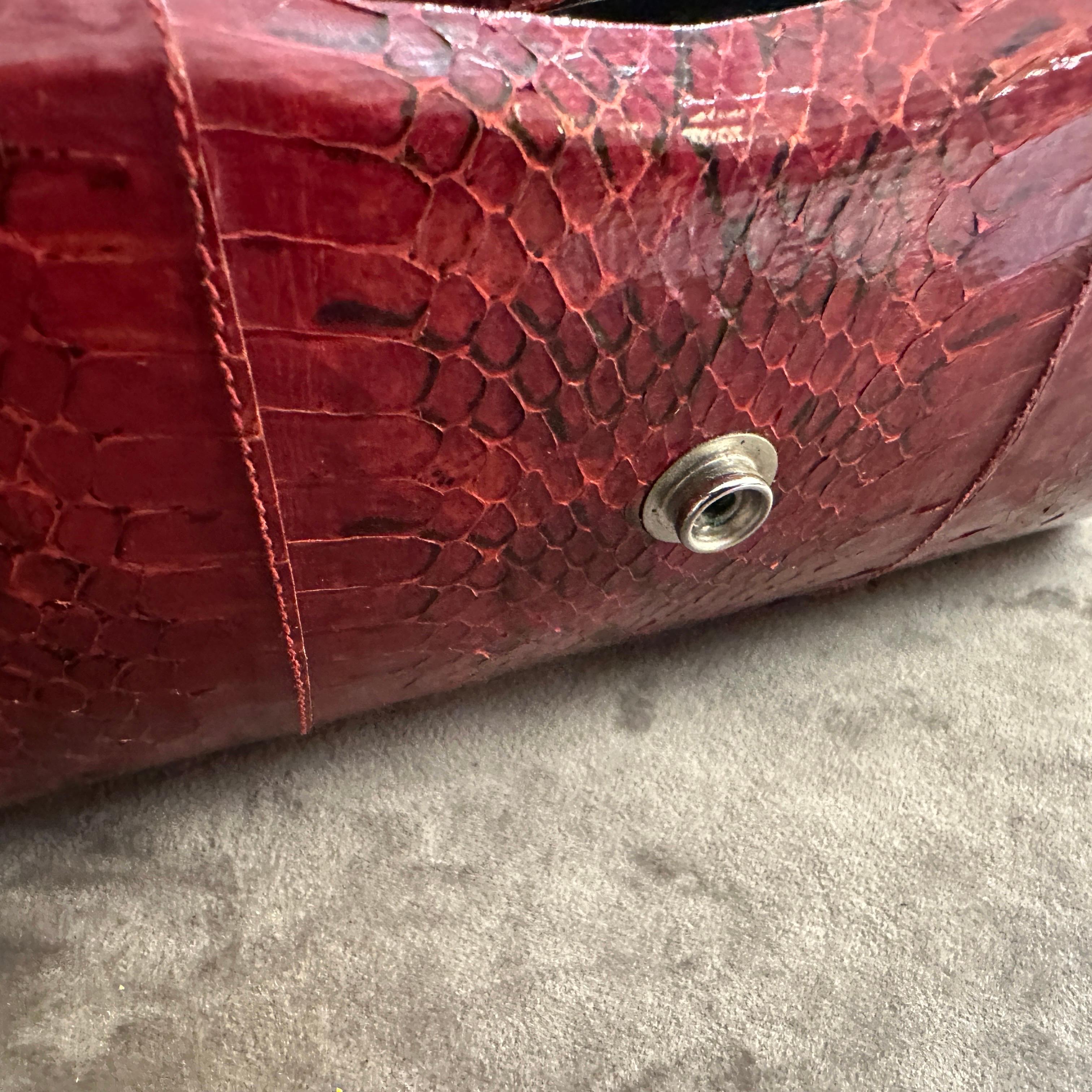 A 1970s Textured Red Leather and Brass ItalianShoulder Bag For Sale 1