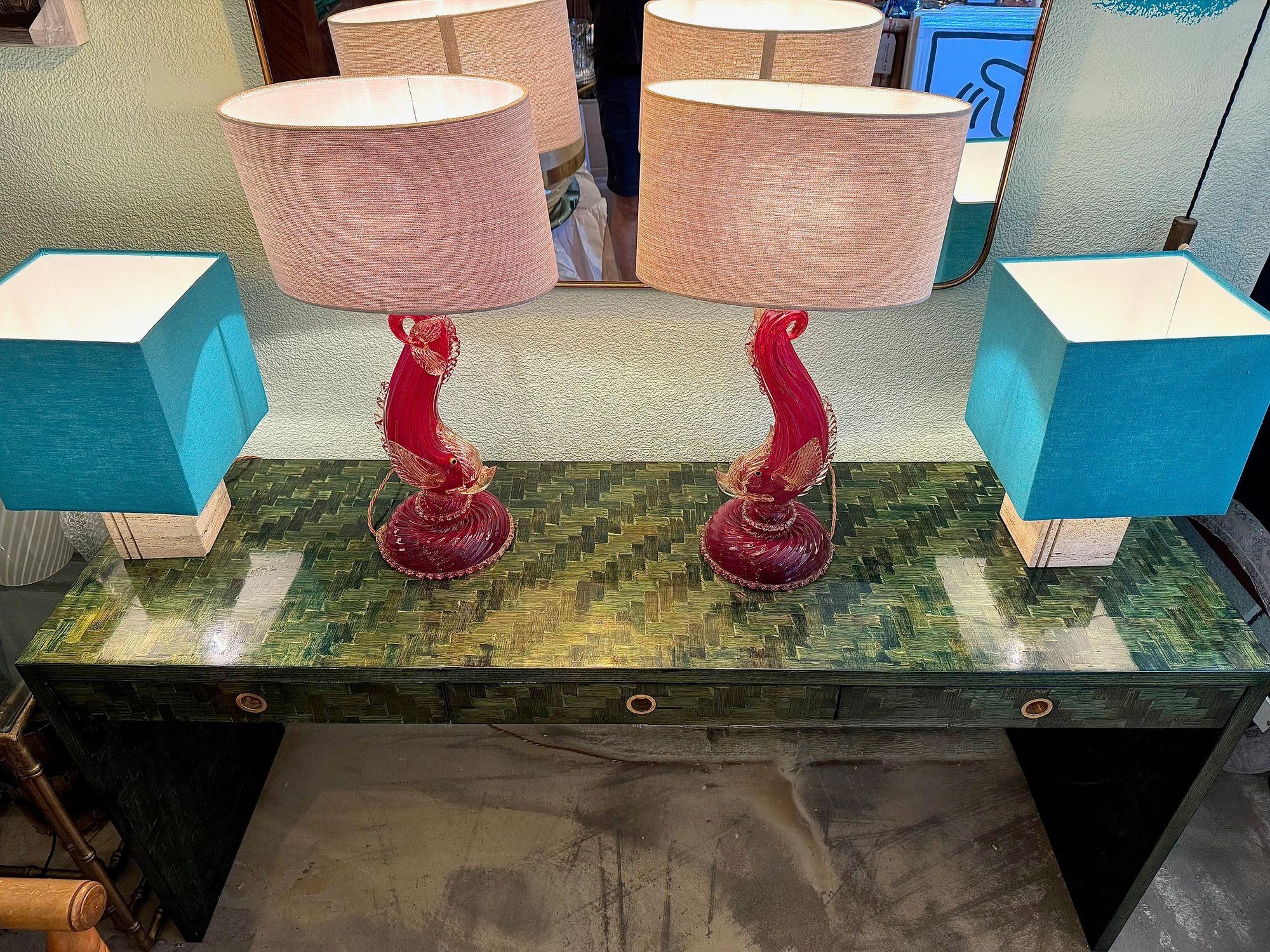 A wonderful 1970s woven green rattan three drawer console table by Vivai Del Sud with brass ring handles. 