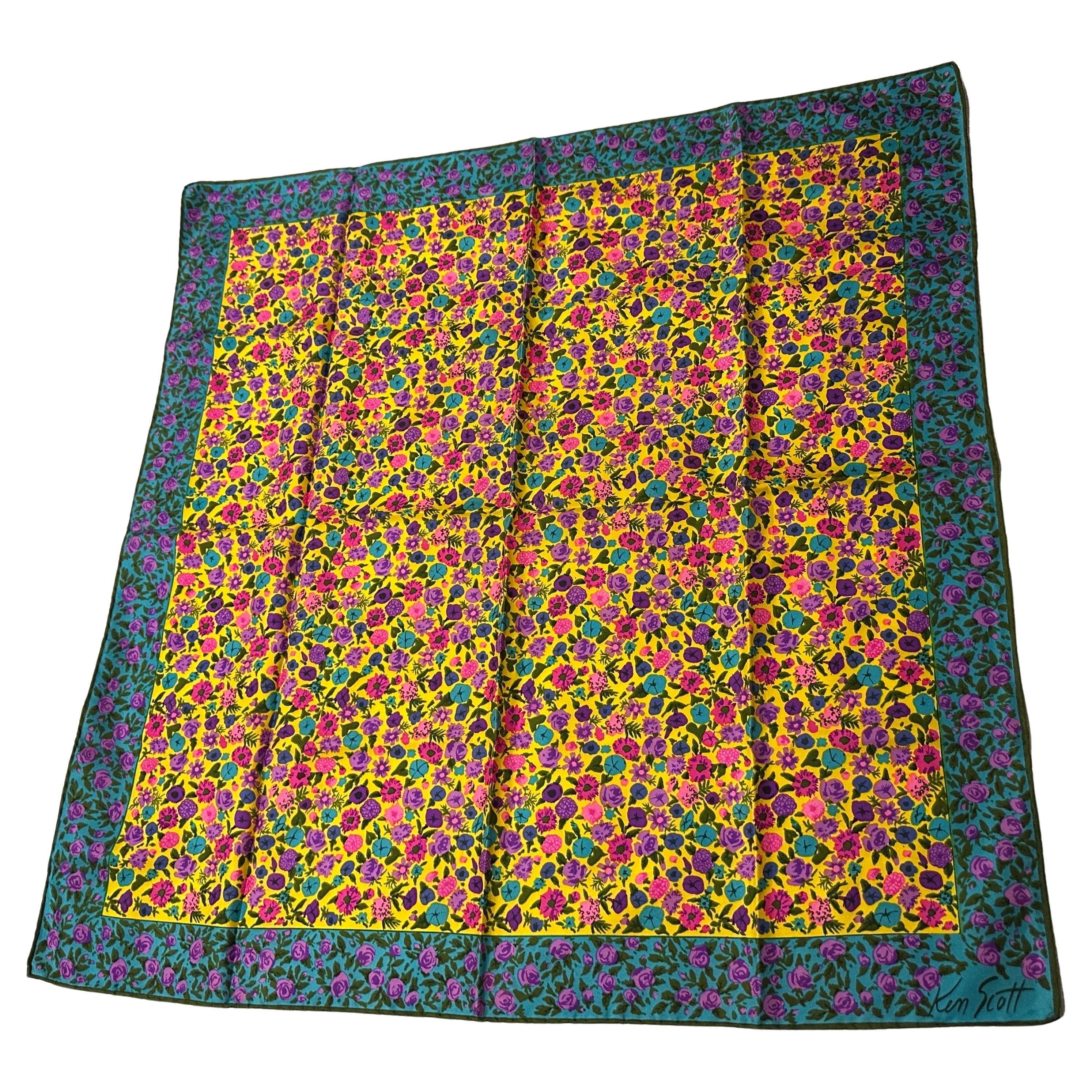 Add a vibrant touch of vintage flair to any ensemble with this captivating 1980s silk scarf by the celebrated 