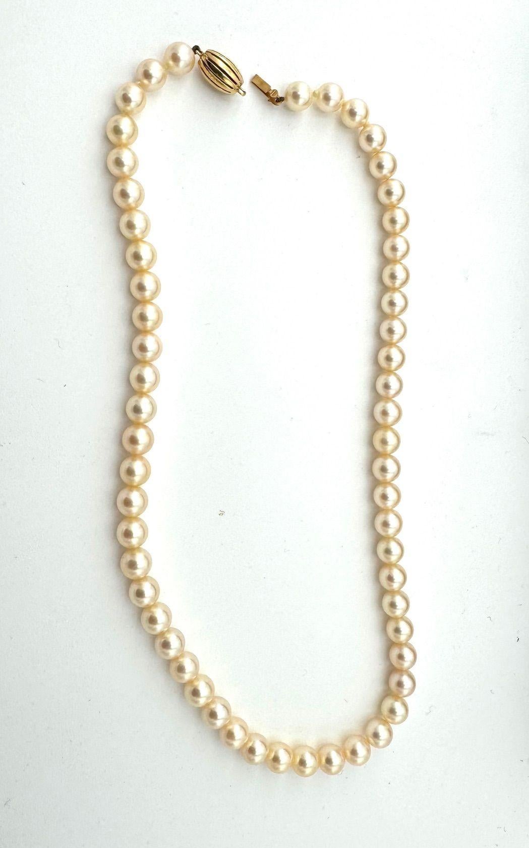 A lovley late 1980s Mappin and Webb Akoya pearl necklace with 18 carat gold clasp in orignal box. There are 56 pearls and each pearl is 6.5-7mm diameter with a high polished lustre and shine, with a rich colour. They have been in the orignal box for