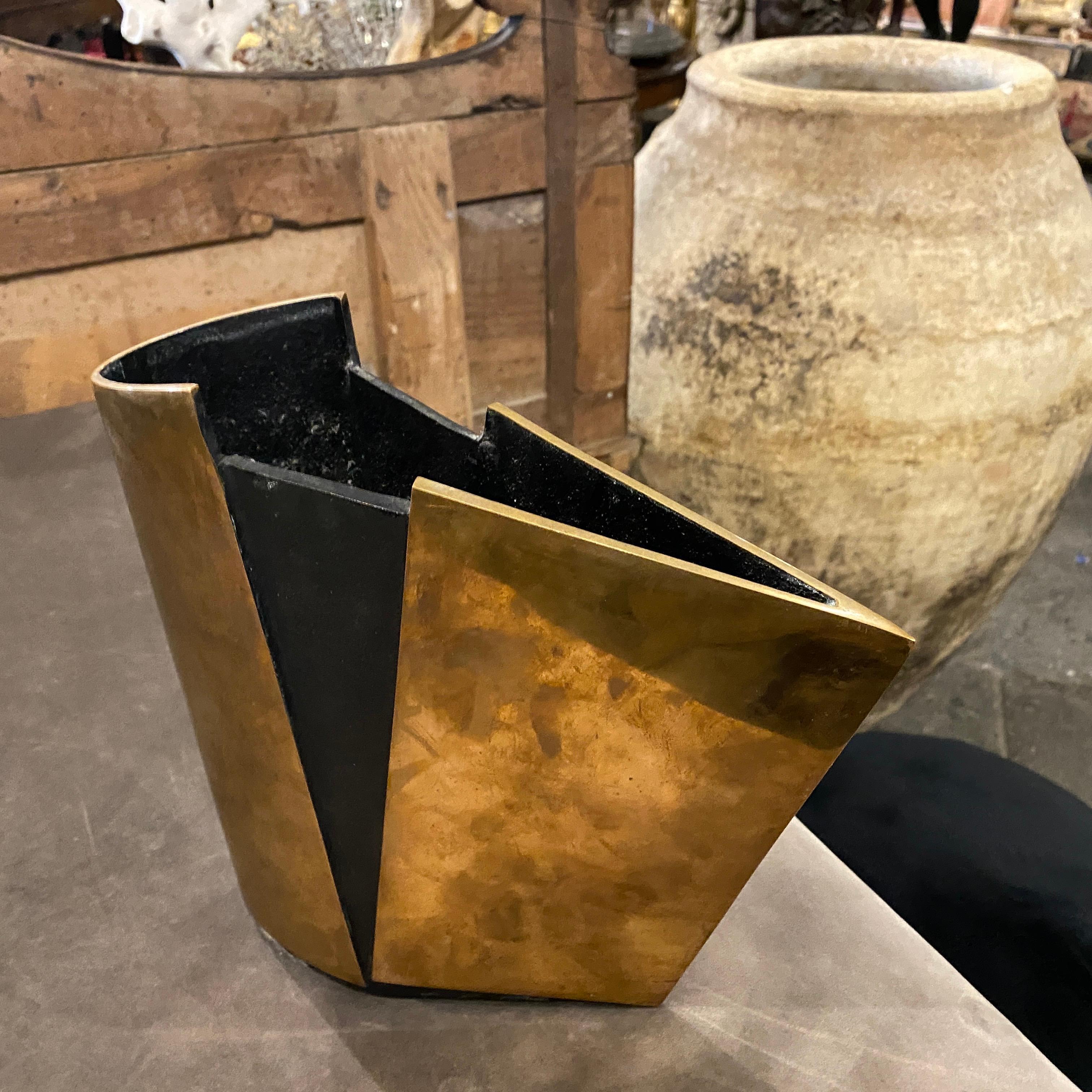 A particular solid bronze vase made in Italy in the Eighties, gilt bronze with mercury alternating with black bronze it's very heavy and in original patina.