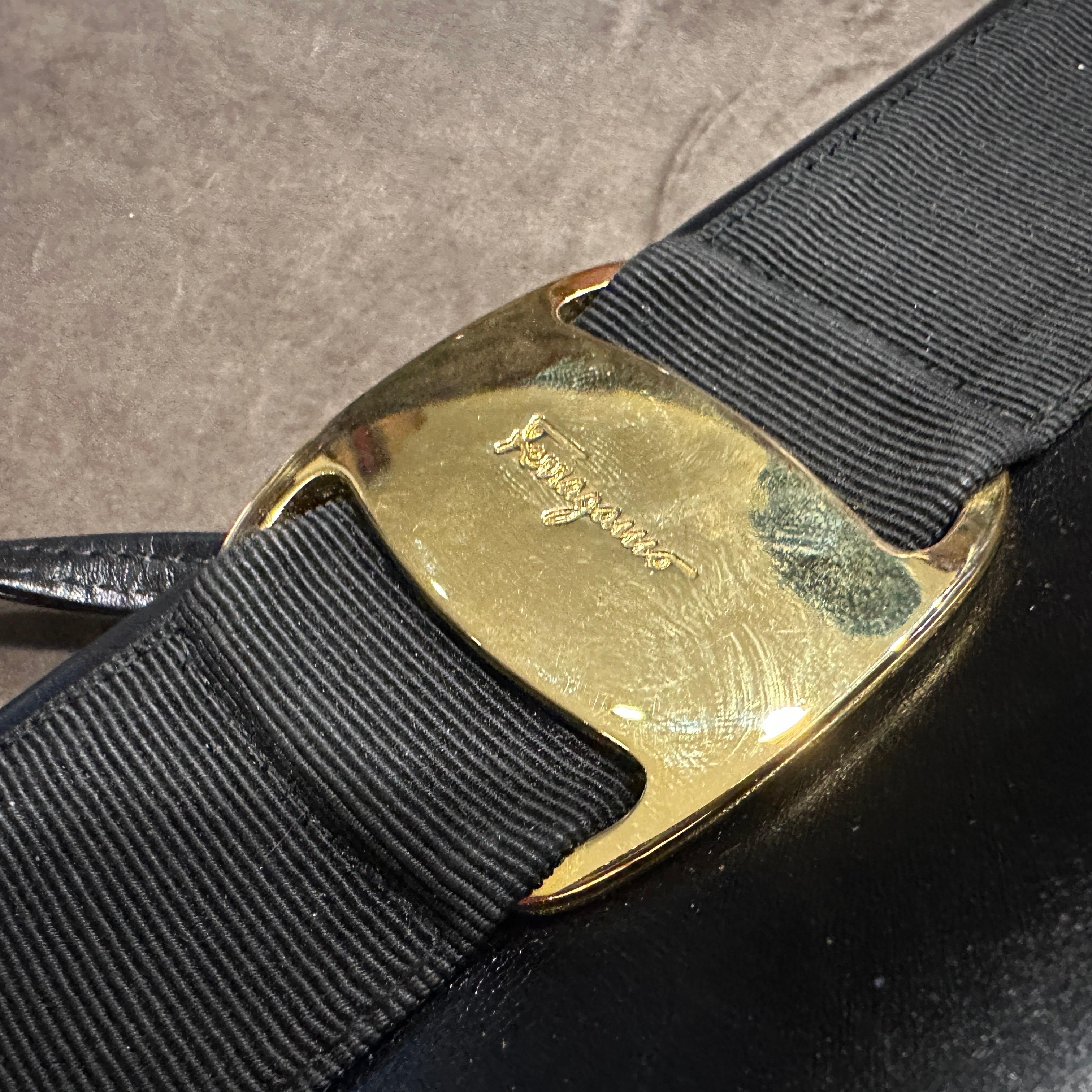 A 1990s Black Leather and Brass Shoulder Bag by Salvatore Ferragamo For Sale 6