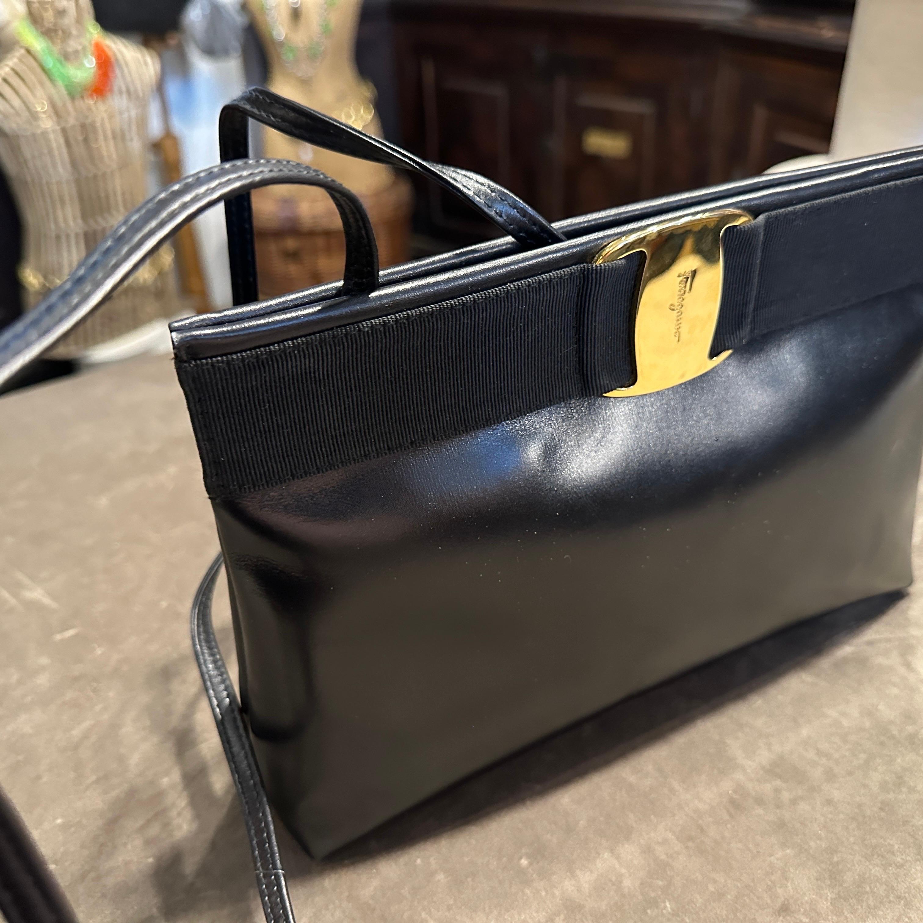 Women's A 1990s Black Leather and Brass Shoulder Bag by Salvatore Ferragamo For Sale