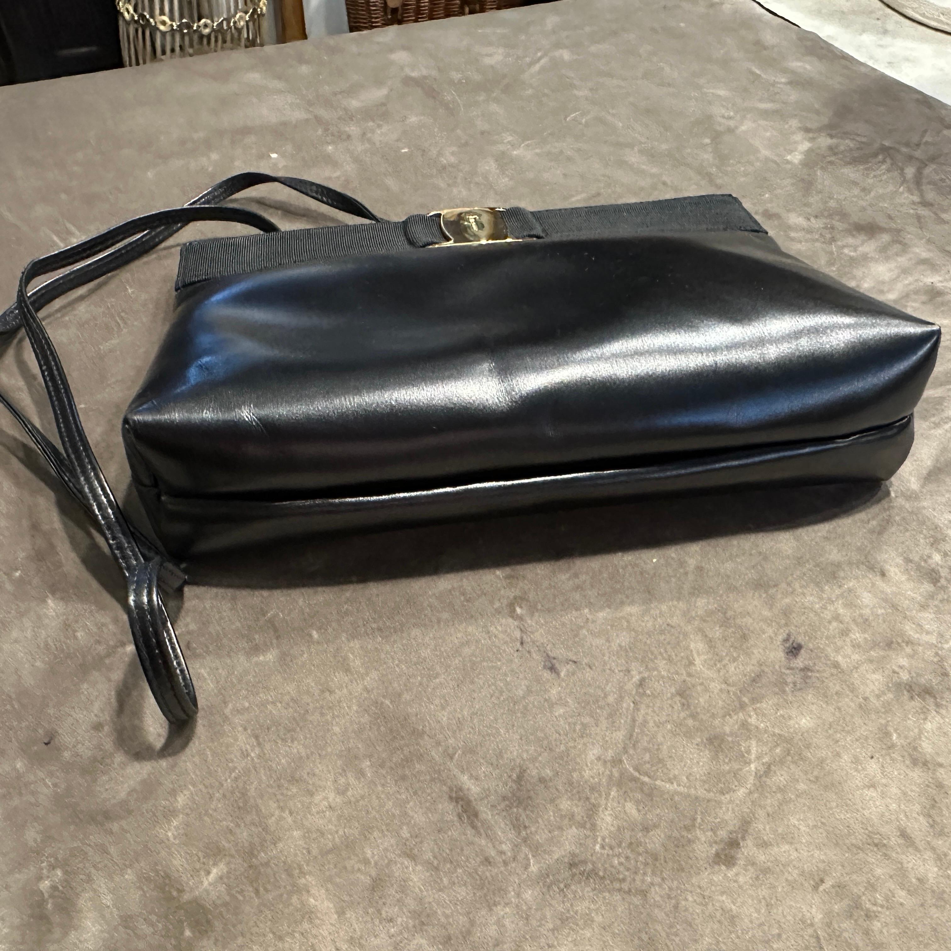 A 1990s Black Leather and Brass Shoulder Bag by Salvatore Ferragamo For Sale 5