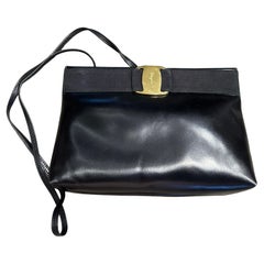 Used A 1990s Black Leather and Brass Shoulder Bag by Salvatore Ferragamo