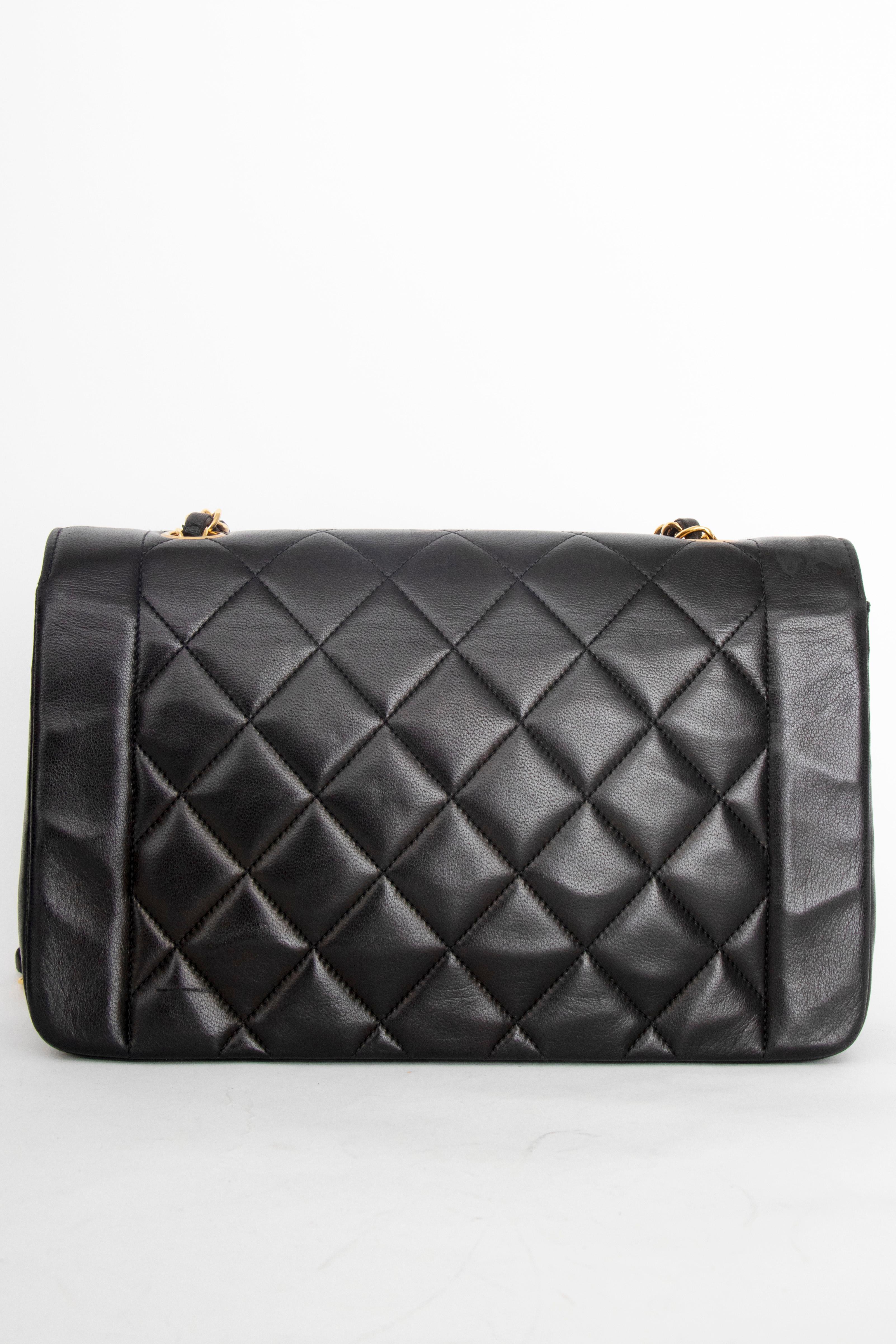 Women's or Men's A 1990s Chanel Black Quilted Lambskin Bag Gold Hardware For Sale