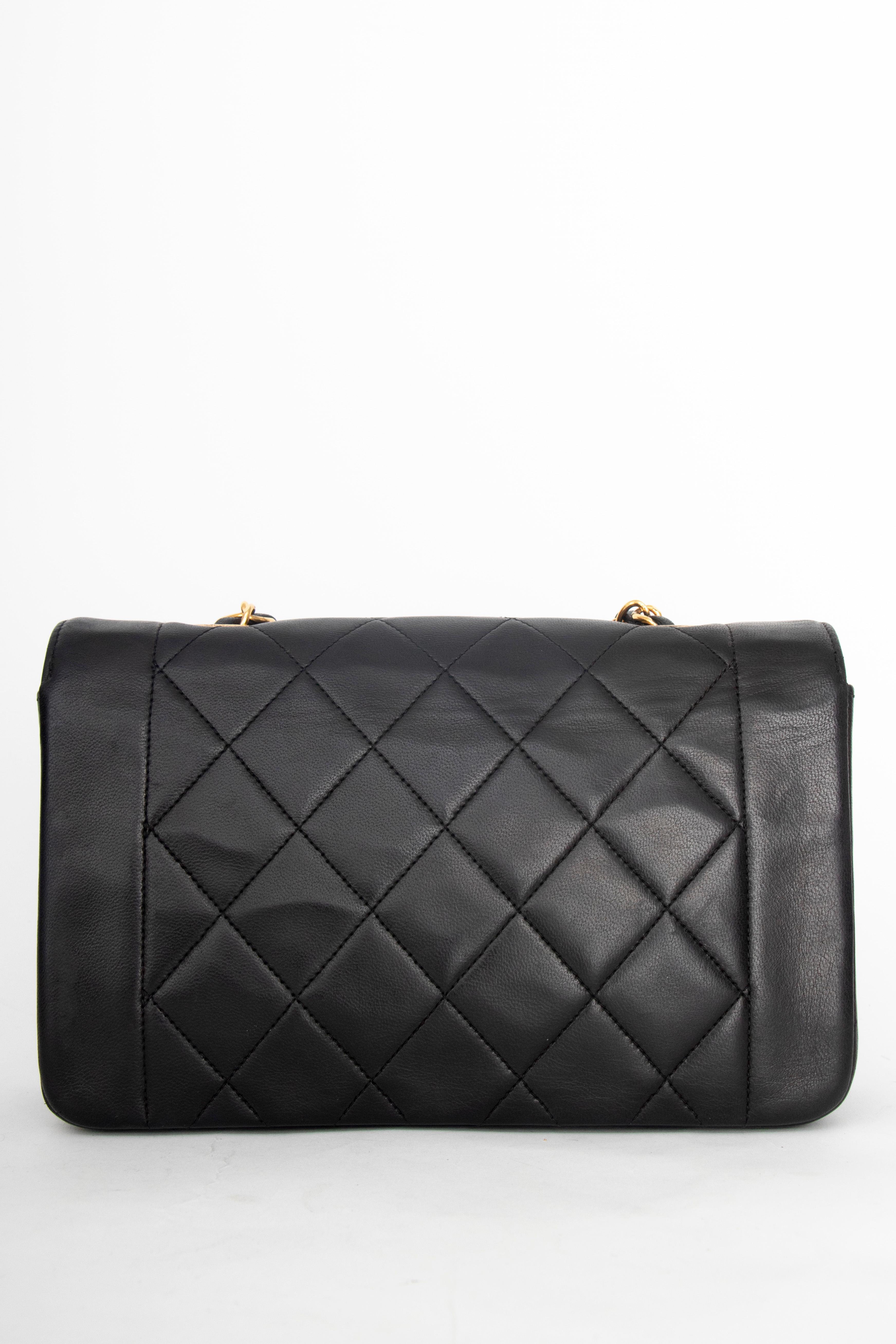 A 1990s Chanel Black Quilted Lambskin Bag Gold Hardware  1