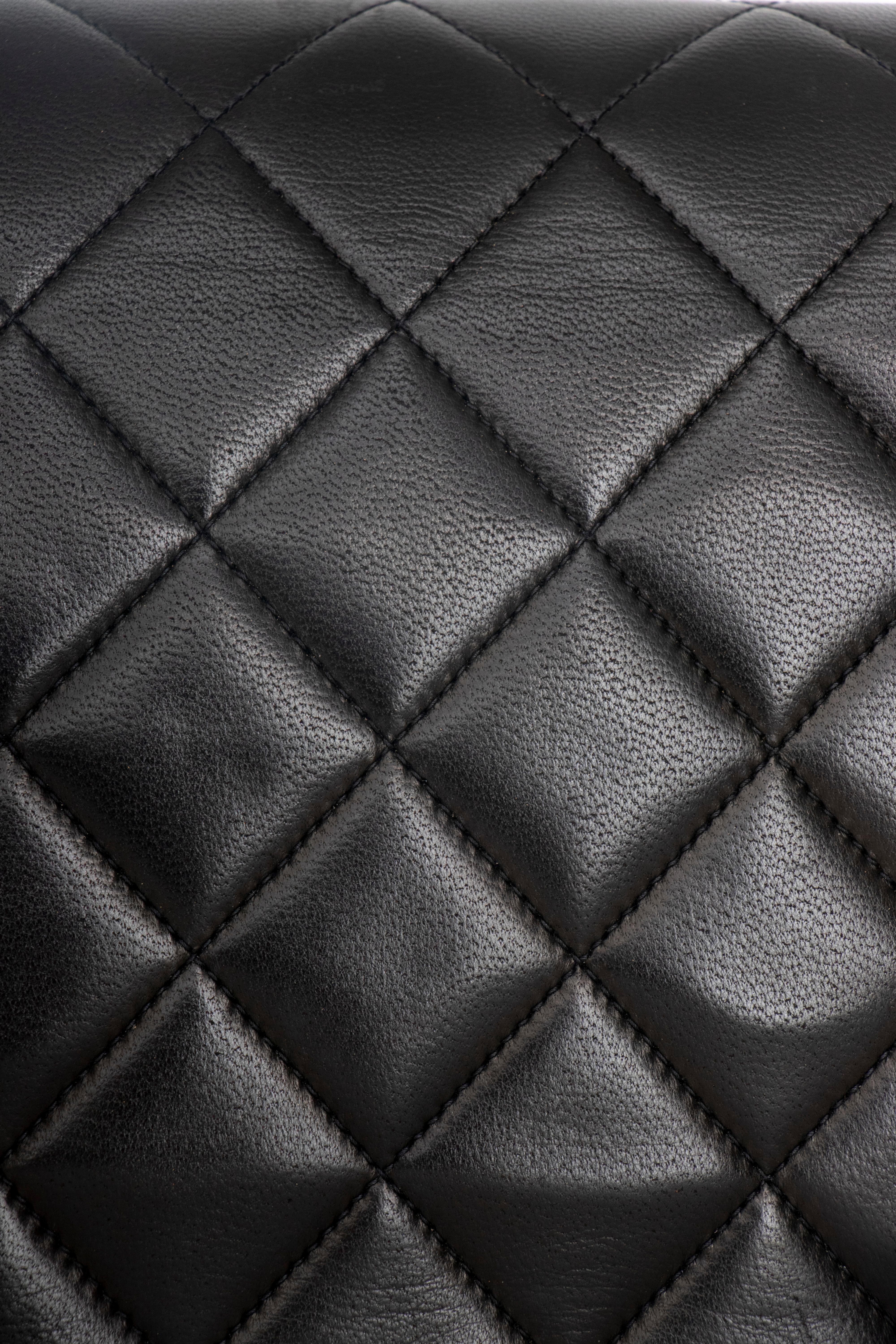 A 1990s Chanel Black Quilted Lambskin Bag Gold Hardware For Sale 2