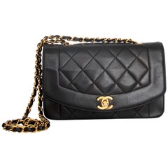 A 1990s Chanel Black Quilted Lambskin Bag Gold Hardware 