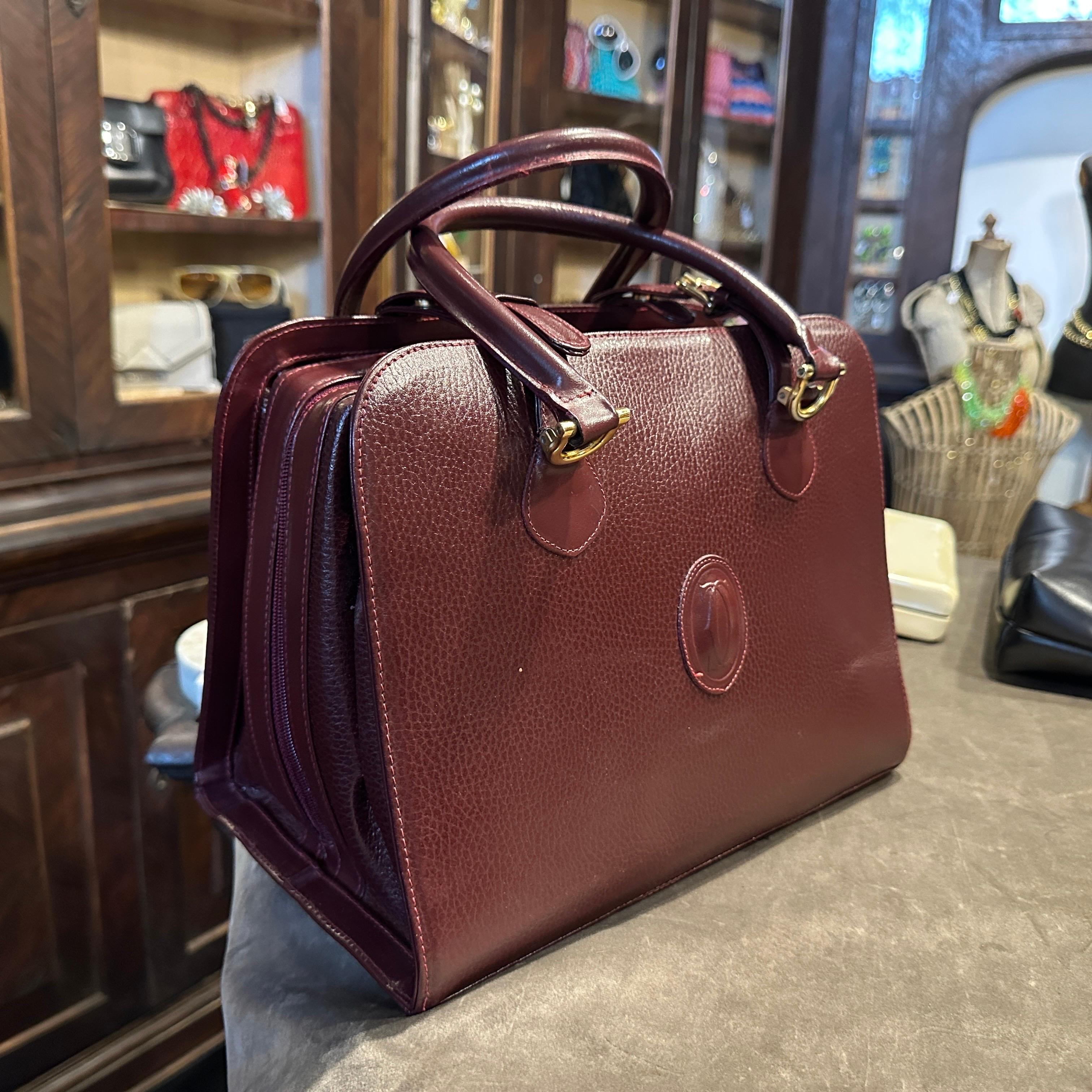 A 1990s Elegant Bordeaux Leather and Brass by Cartier For Sale 5