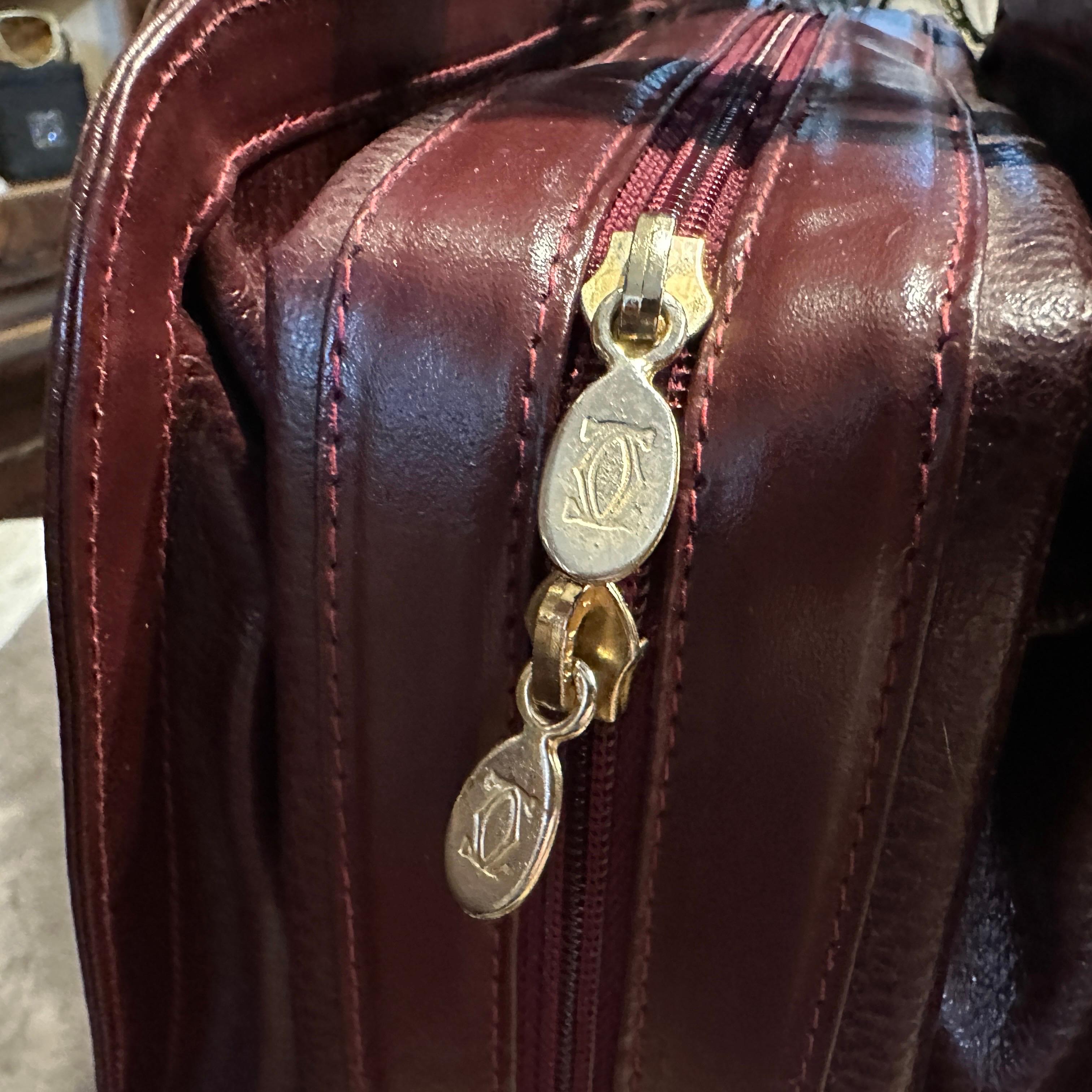 A 1990s Elegant Bordeaux Leather and Brass by Cartier For Sale 8