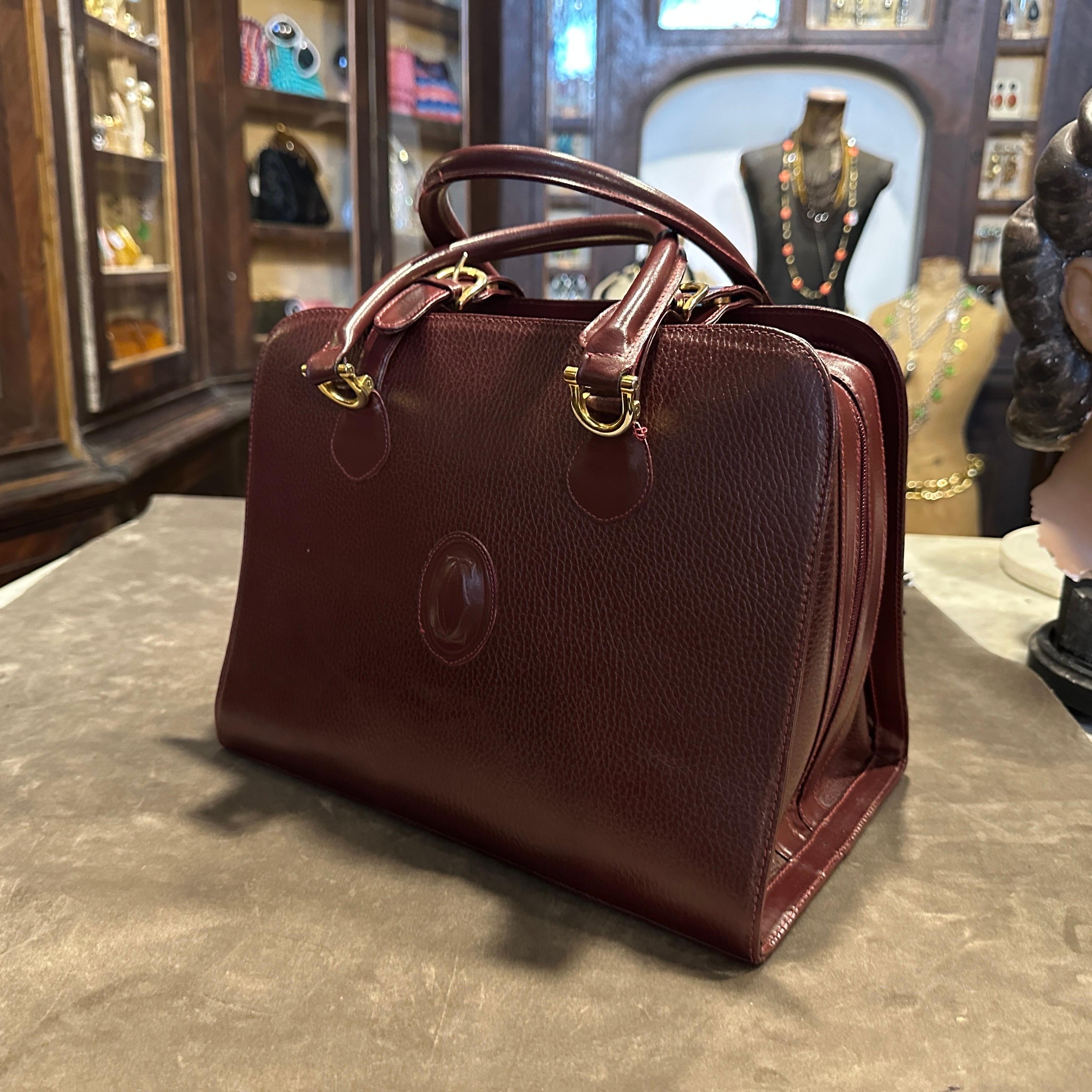 A 1990s Elegant Bordeaux Leather and Brass by Cartier For Sale 11