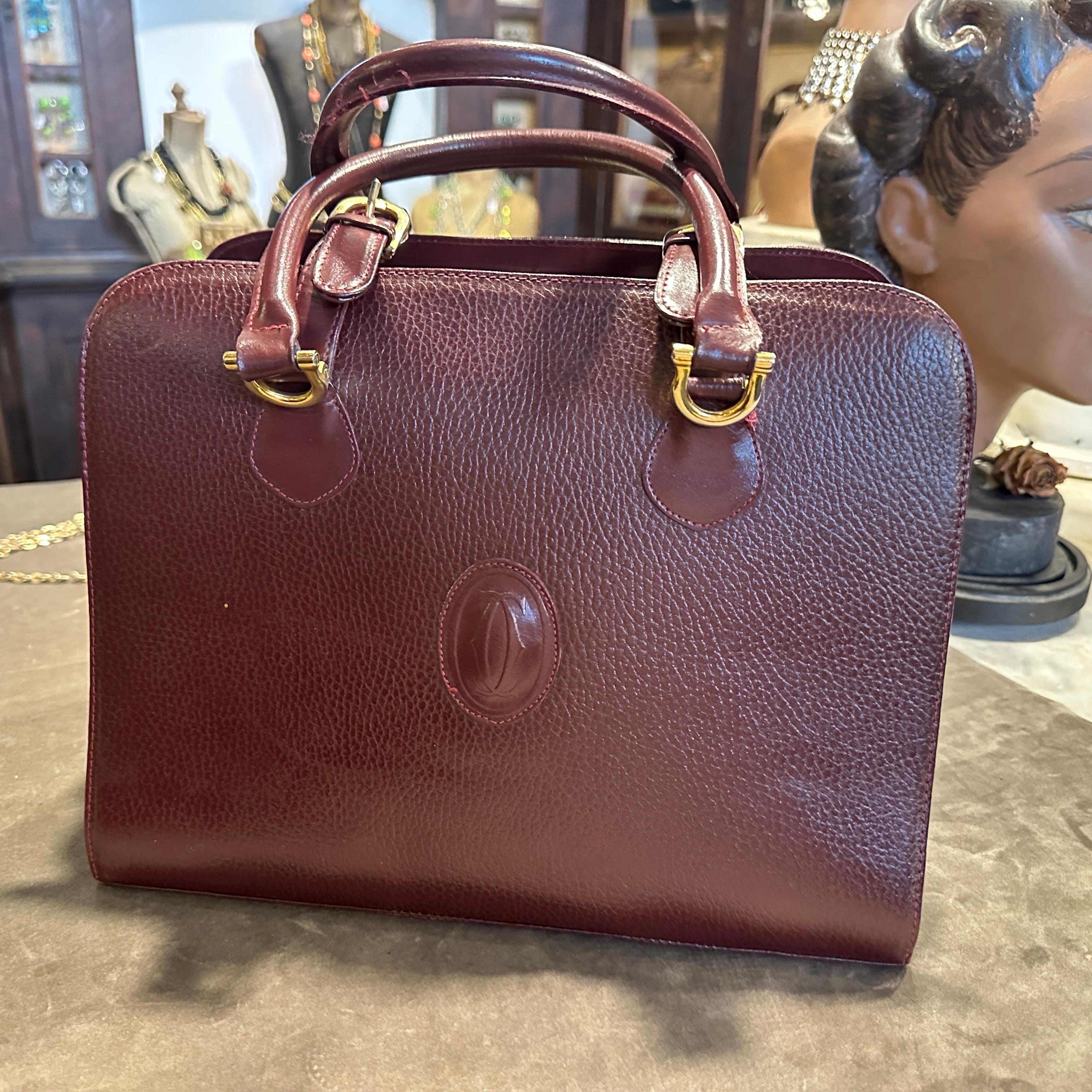 A 1990s Elegant Bordeaux Leather and Brass by Cartier For Sale 12