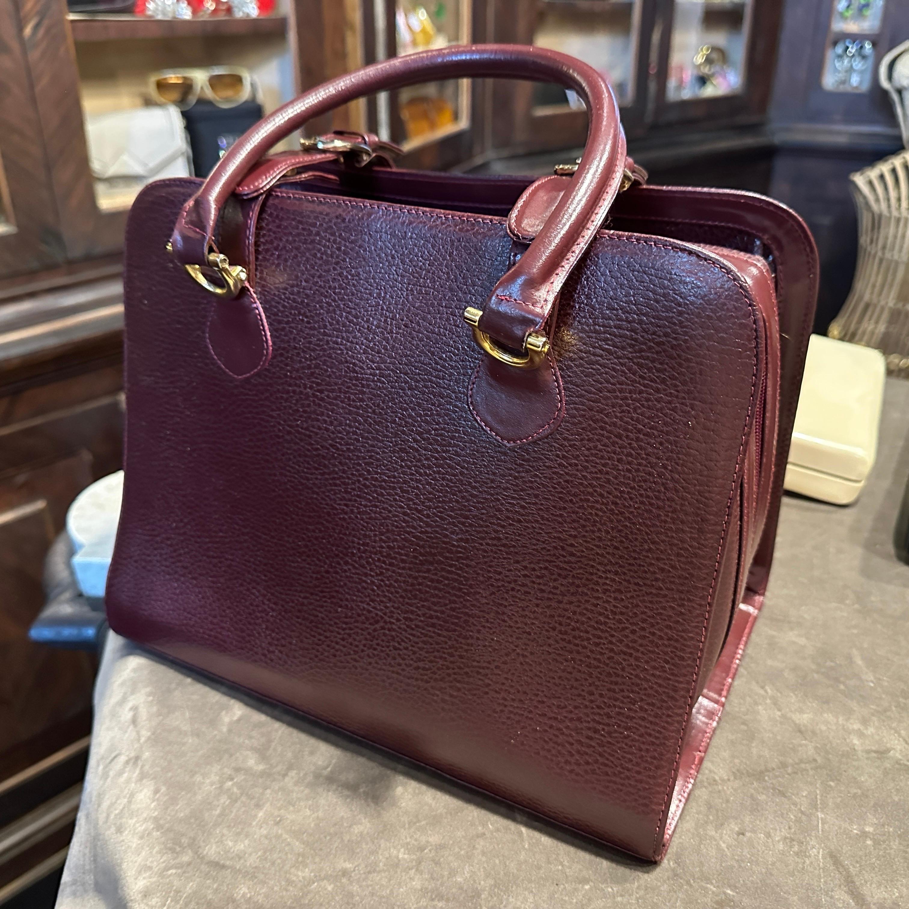 Women's A 1990s Elegant Bordeaux Leather and Brass by Cartier For Sale