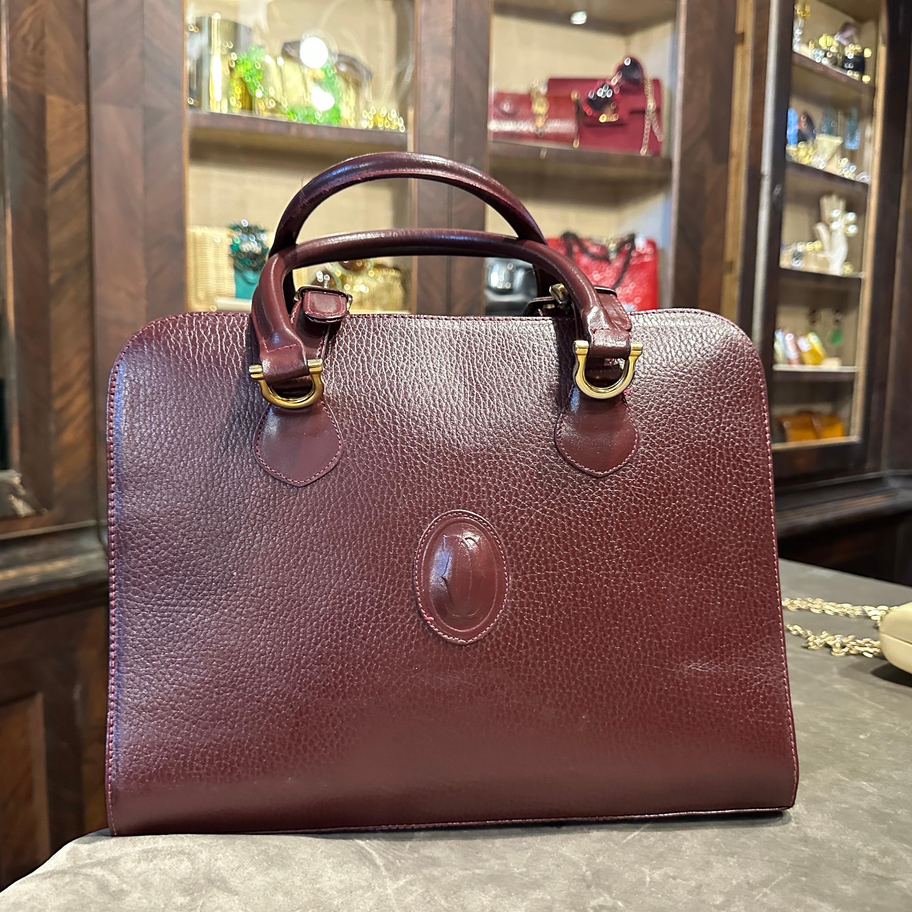 A 1990s Elegant Bordeaux Leather and Brass by Cartier For Sale 1