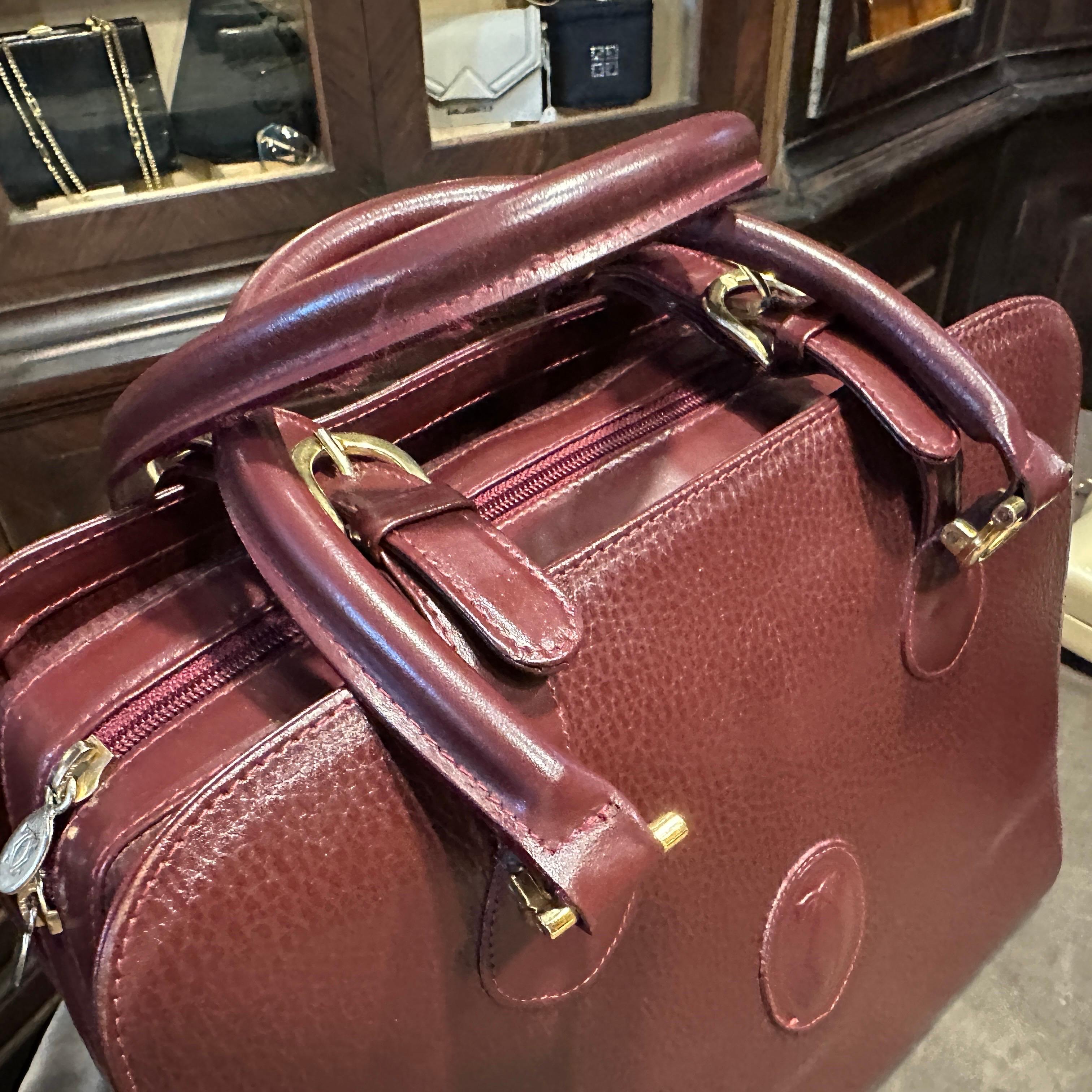 A 1990s Elegant Bordeaux Leather and Brass by Cartier For Sale 3