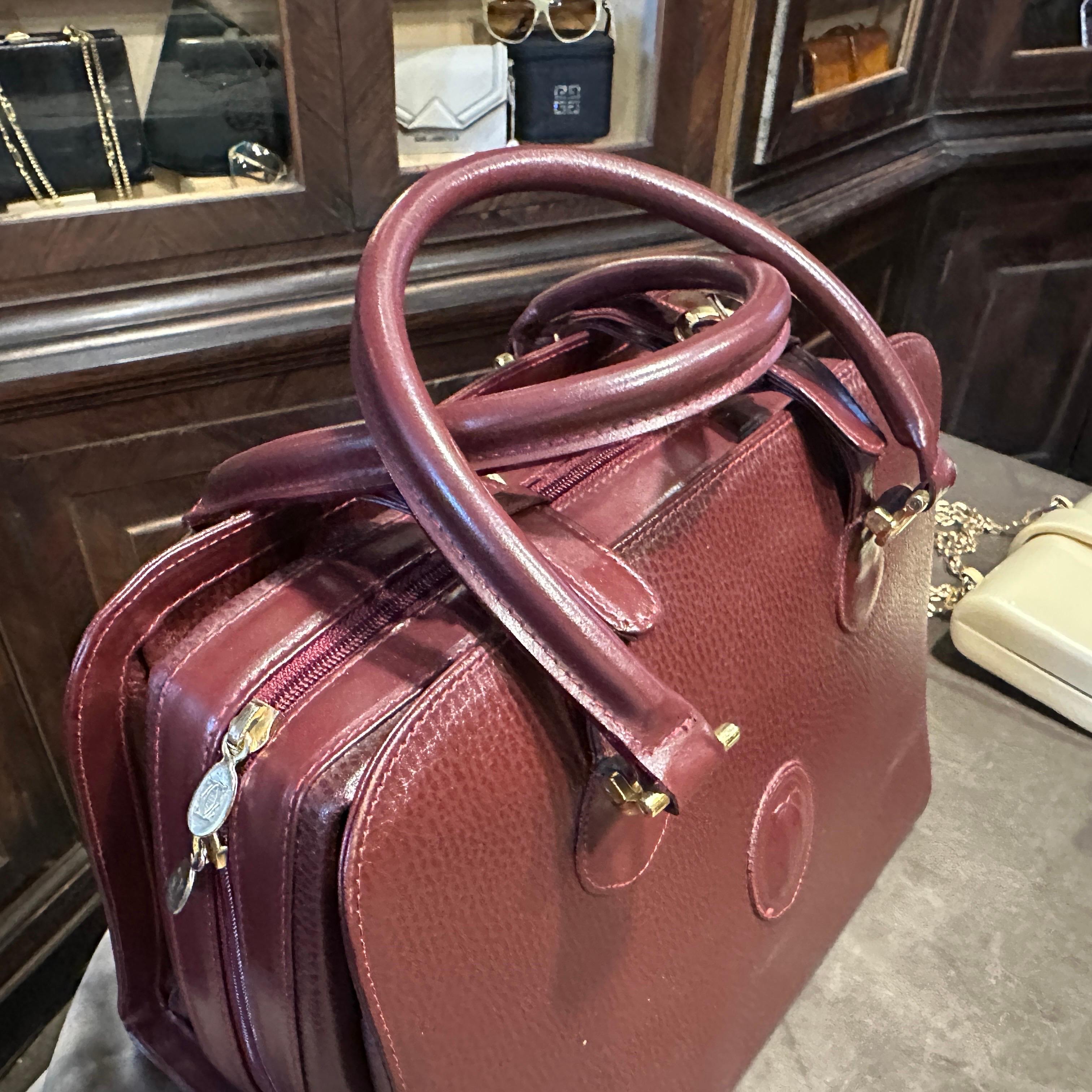 A 1990s Elegant Bordeaux Leather and Brass by Cartier For Sale 4