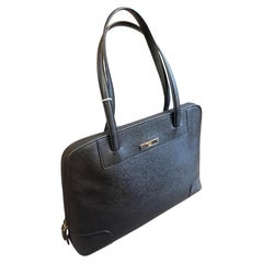 A 1990s Gucci Black Textured Leather and Brass Hardware shoulder Bag
