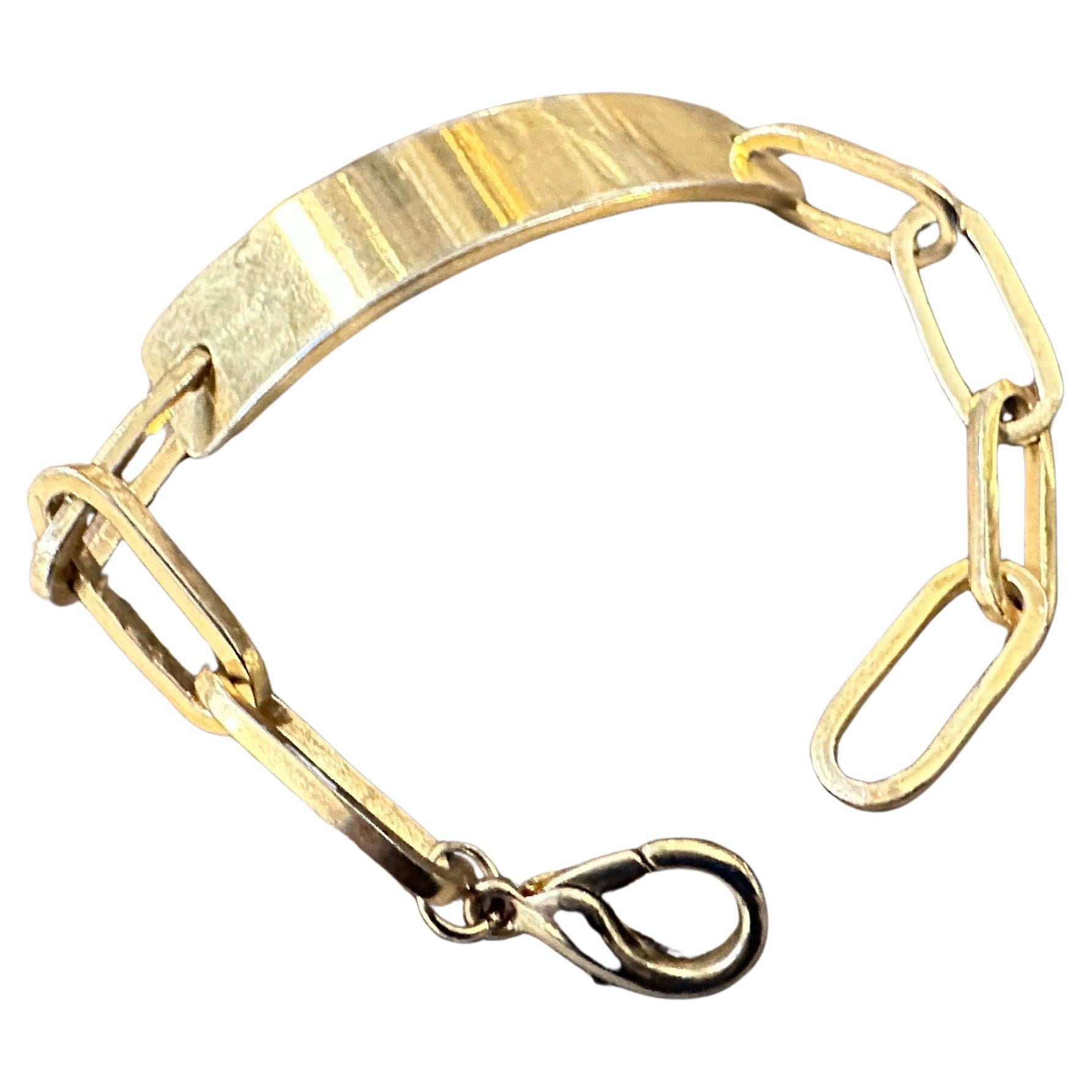 A 1990s Iconic Gilded Metal Bracelet by Emilio Pucci For Sale