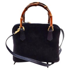 A 1990s Iconic Gucci Bamboo Navy Blue Suede Leather Hand Bag