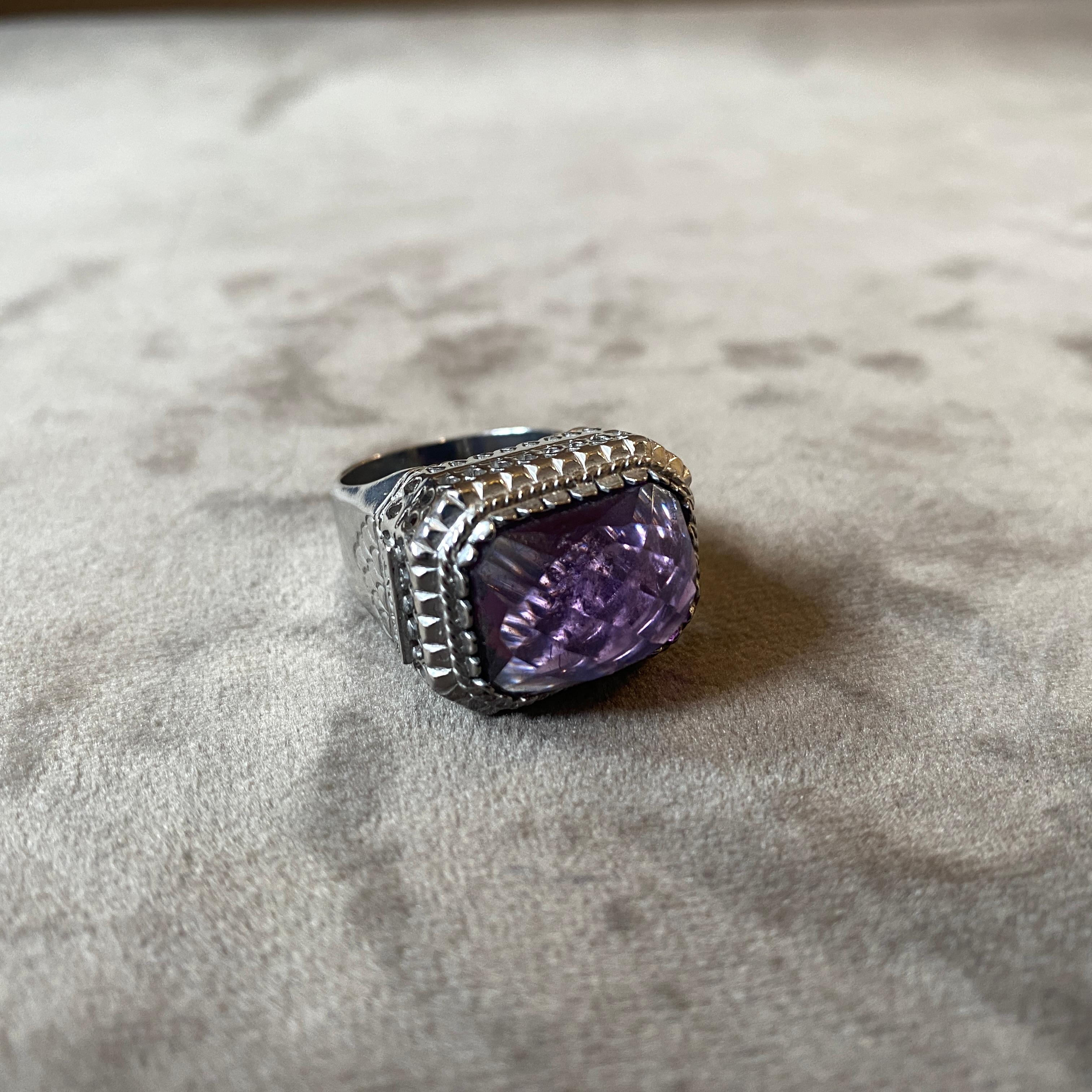 An hand-crafted cocktail ring manufactured  in Italy in the Nineties by Anomis, it's in lovely condition, the amethyst color briolette cut hydrothermal quartz and the rhodium plated sterling silver gives it a real jewel look. The Cocktail Ring by