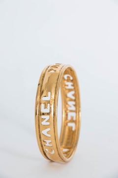 A 1990s Slim Chanel Gold Plated Bangle