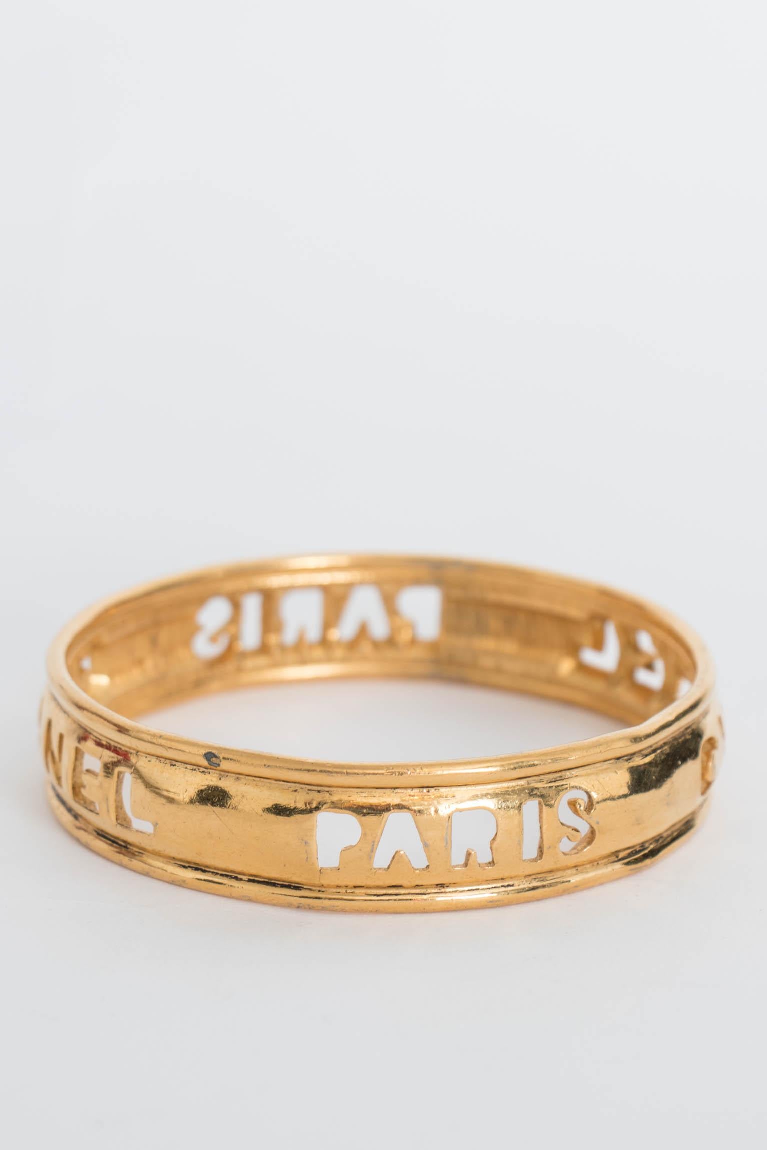 Women's or Men's A 1990s Slim Chanel Gold Plated Bangle For Sale