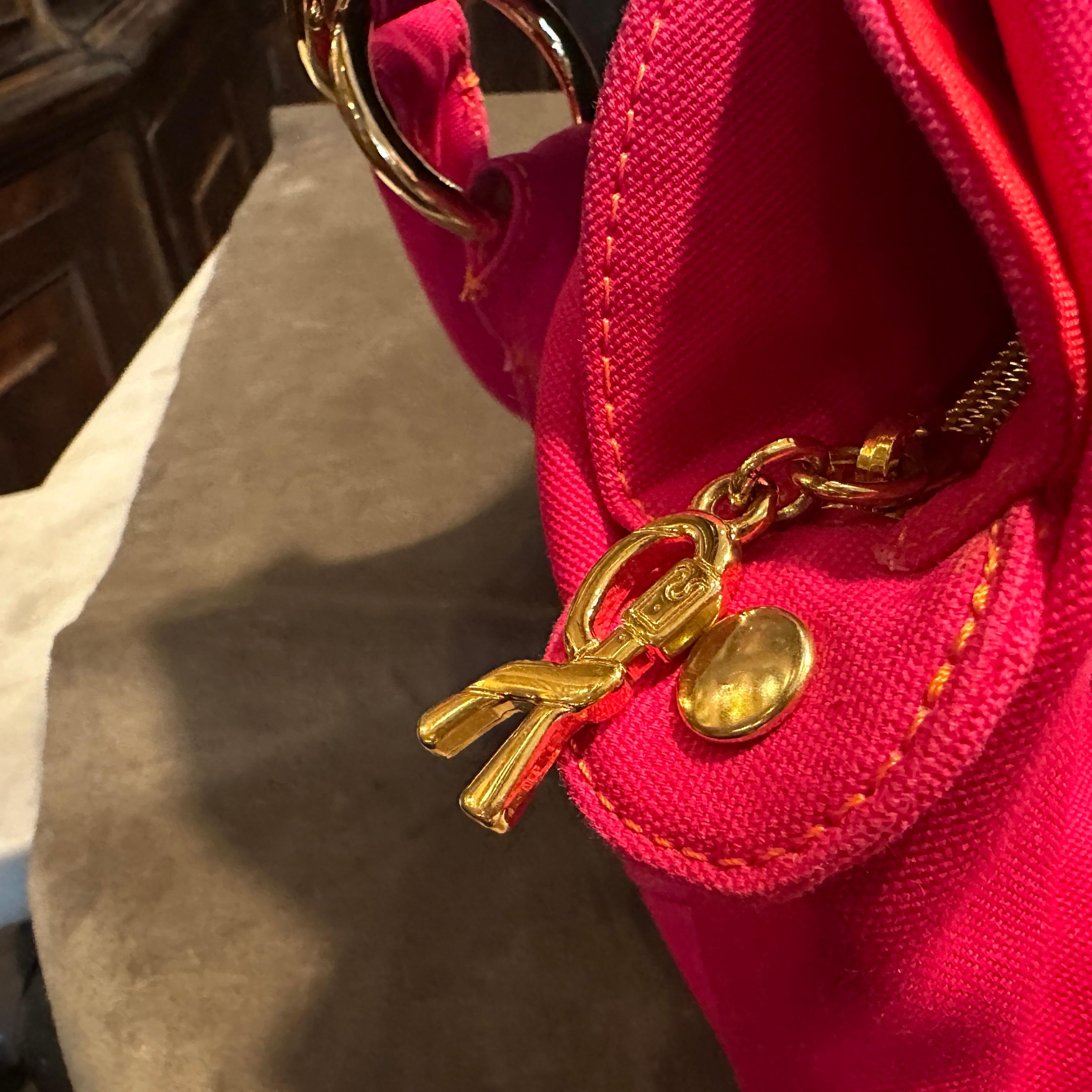 A 1990s Vibrant Pink and Green Fabric Top Handle Bag By Roberta di Camerino For Sale 6