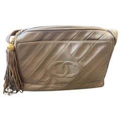A 1990s Vintage Chanel Beige-Gray Lambskin LeatherCamera-Style Shoulder Bag
