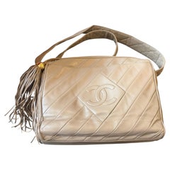 A 1990s Vintage Chanel Beige-Gray Lambskin LeatherCamera-Style Shoulder Bag