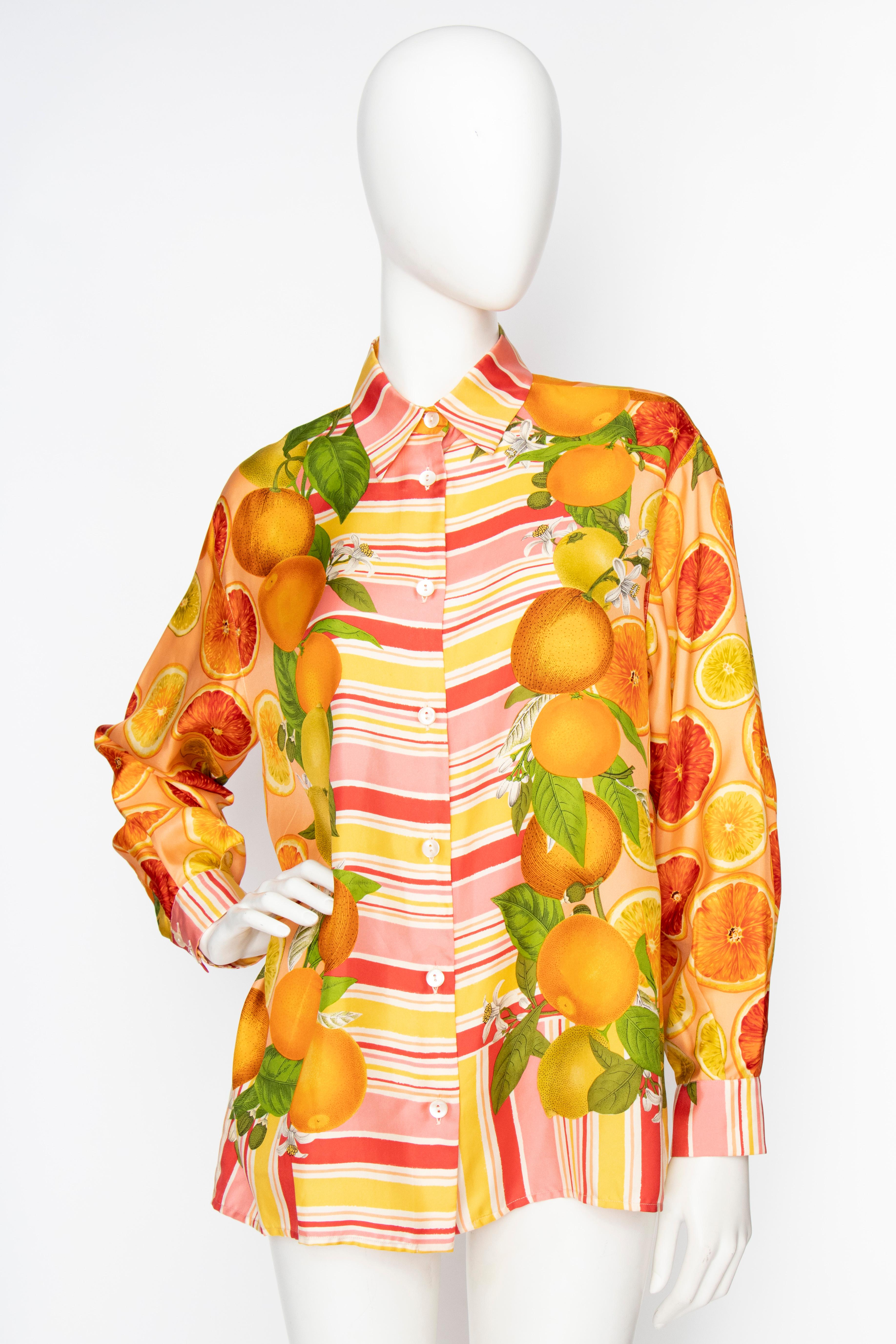 A 1990s Gucci silk twill blouse with fitted cuffs, a buttoned-down front and an incredibly vibrant fruit print. 

The size corresponds to a modern size small, but please note the measurements below to ensure the right fit. 